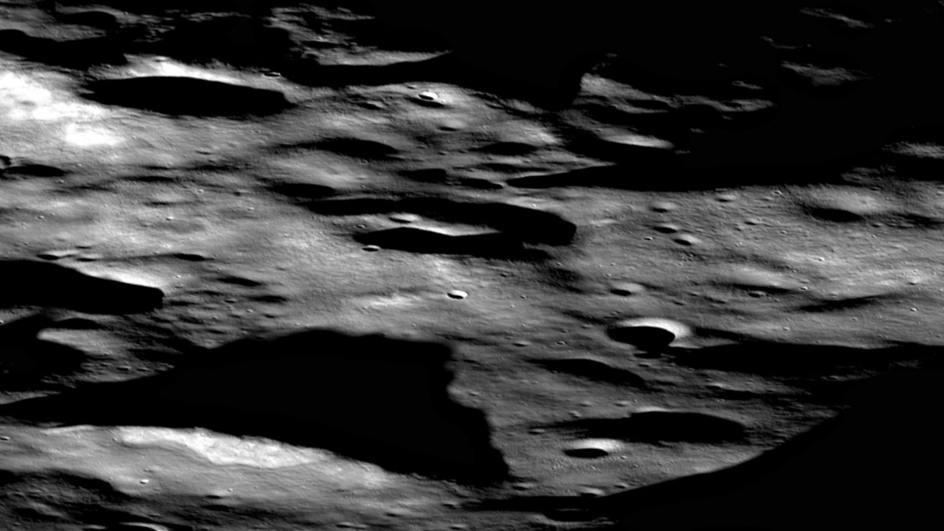Oblique view of a part of the Compton-Belkovich volcanic complex highlighting the Alpha (right side) and Beta (left center) domes (image 6700 m wide in center). The Alpha dome is a