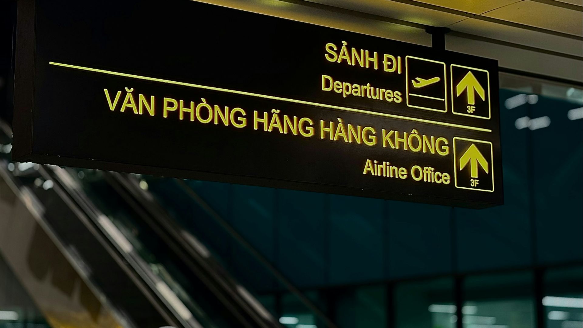 Airport signs for departures and airline office