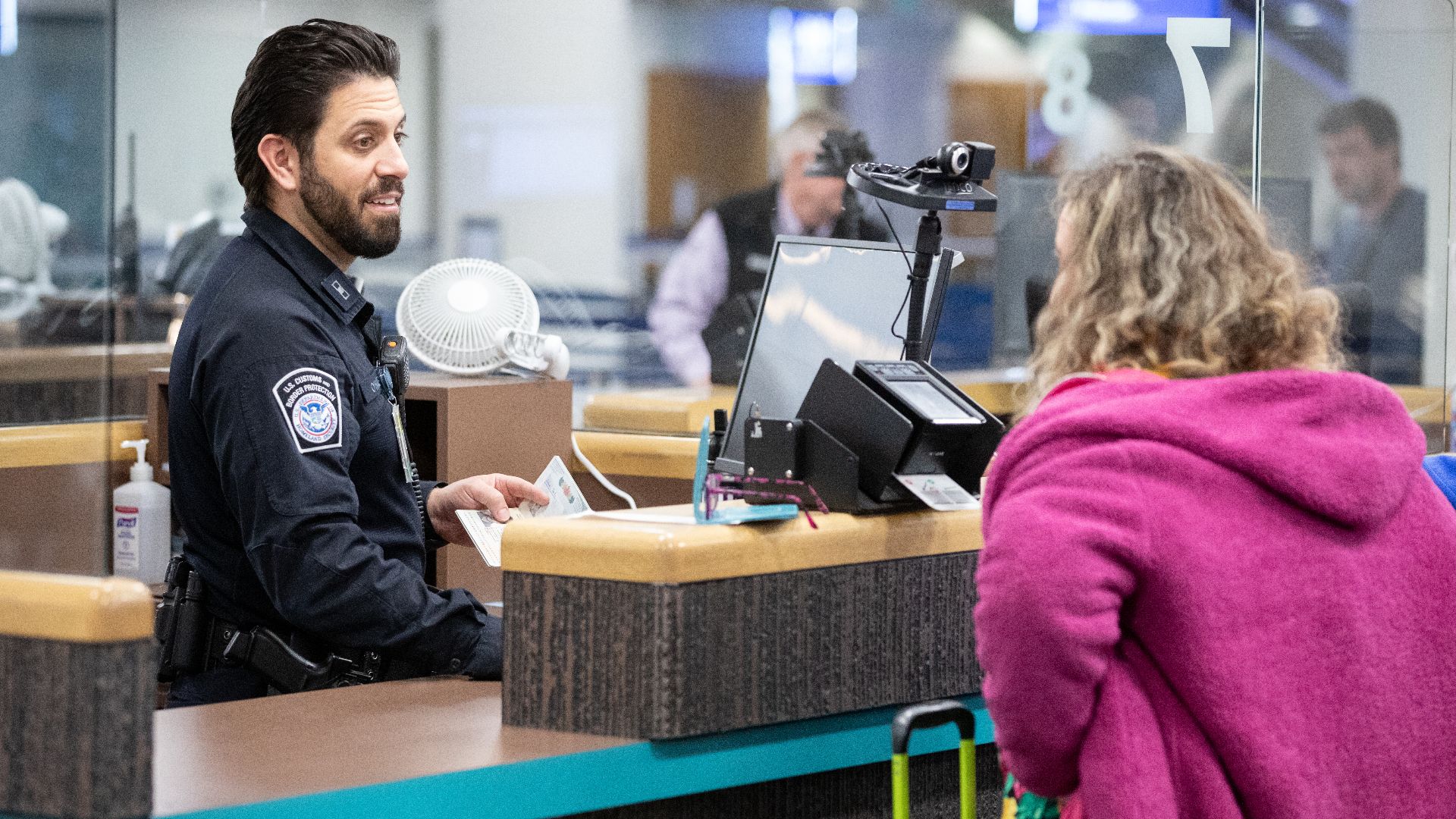 A U.S. Customs and Border Protection officer processes arriving international passengers at Phoenix Sky Harbor International Airport in Phoenix, Ariz., December 11, 2024. CBP Photo by Jerry Glaser