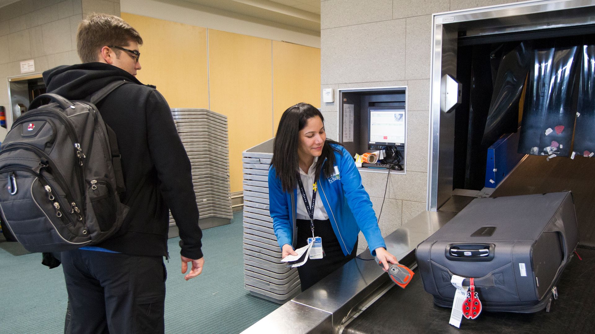 Vancouver, Canada - U.S. Customs and Border Protection (CBP) preclearance operations at Vancouver International Airport.  Seen here passenger baggage tags are scanned for a fast tracking process from departure to arrival during the international travel.

