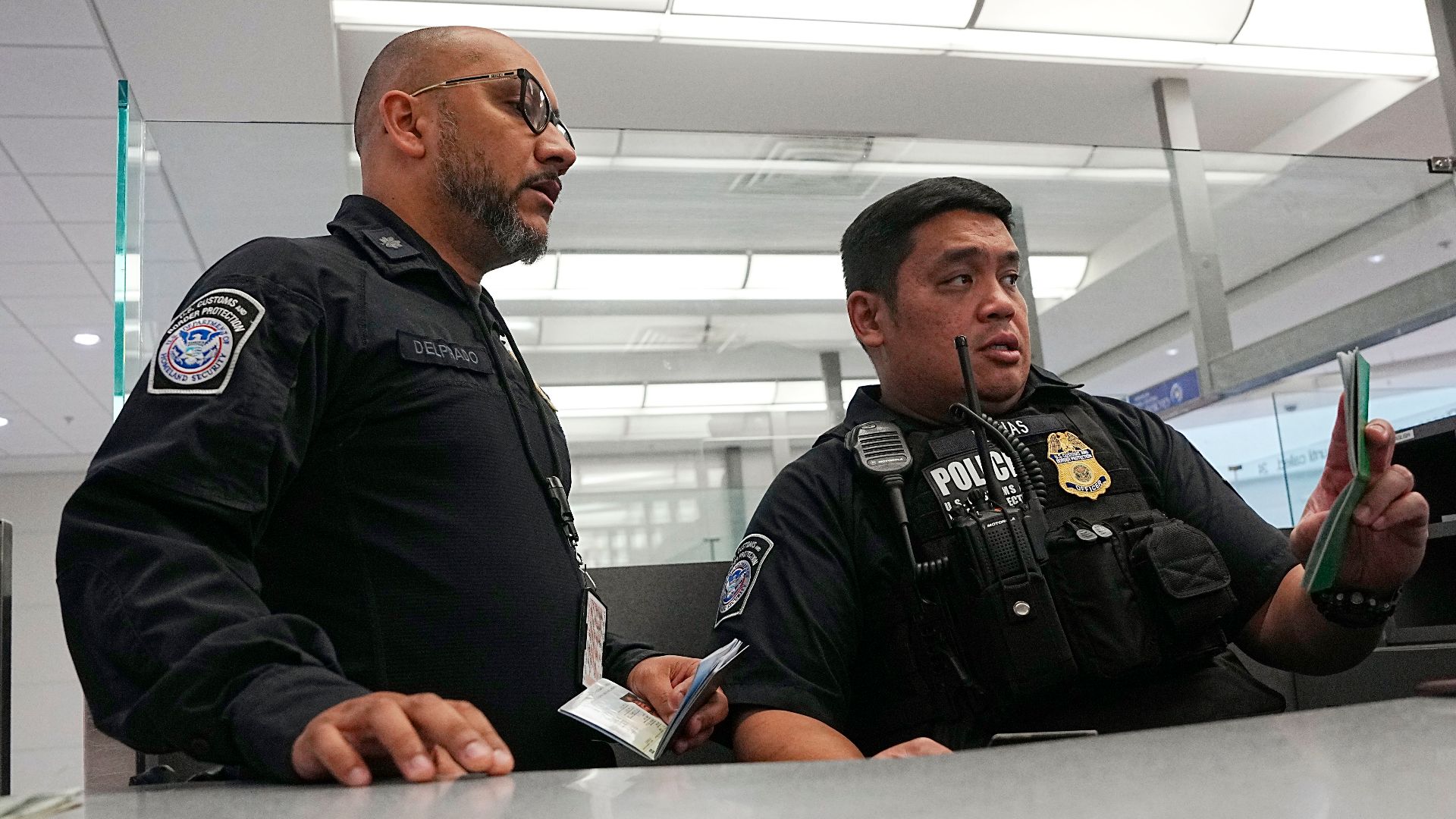 U.S. Customs and Border Protection officers process travelers arriving on international flights at Baltimore/Washington International Thurgood Marshall Airport February 27, 2025. CBP Photo by Glenn Fawcett