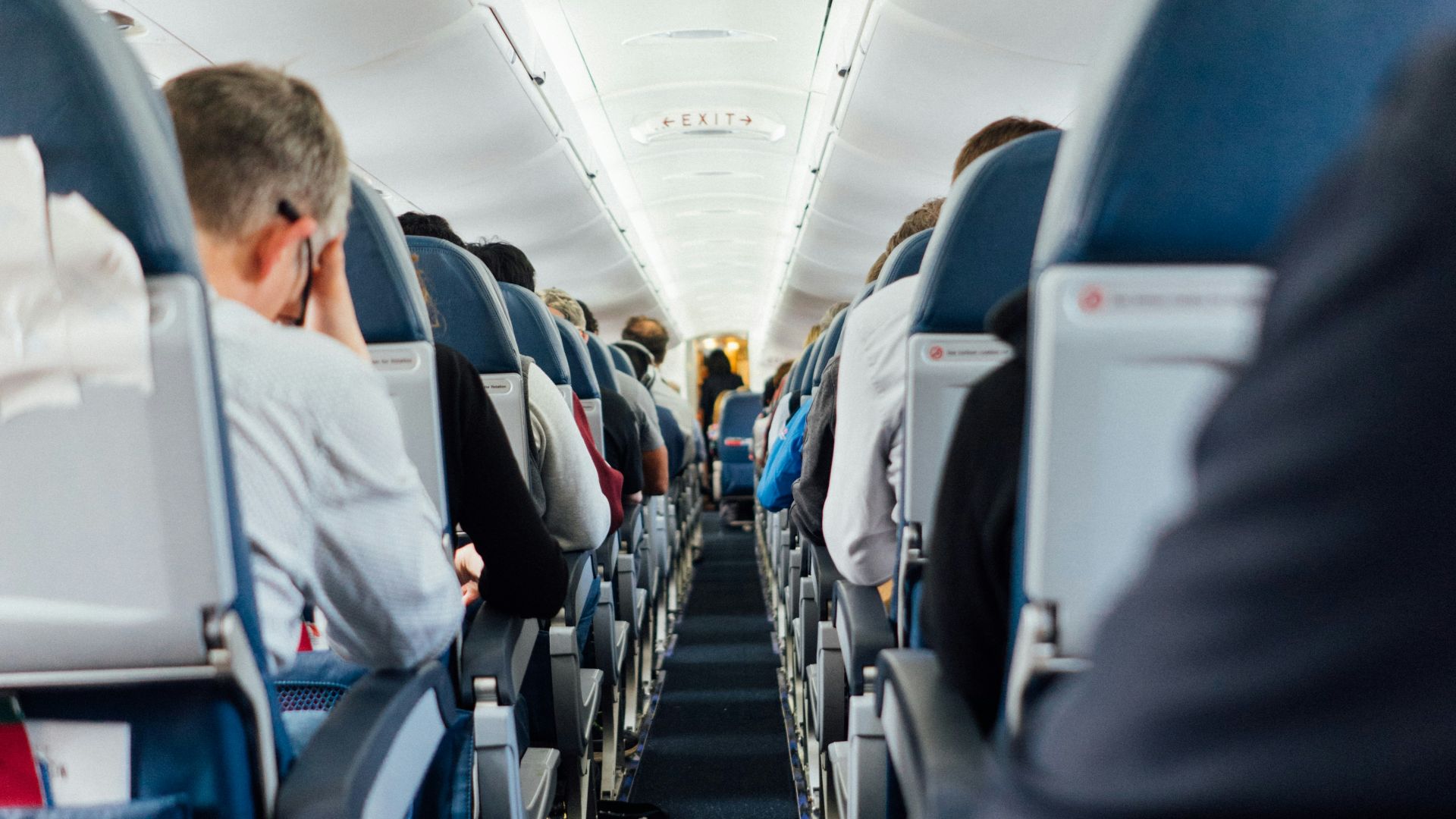 people sitting inside plane
