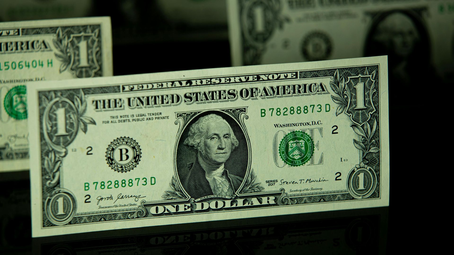 Detailed shot of a one dollar bill highlighting currency and finance themes.