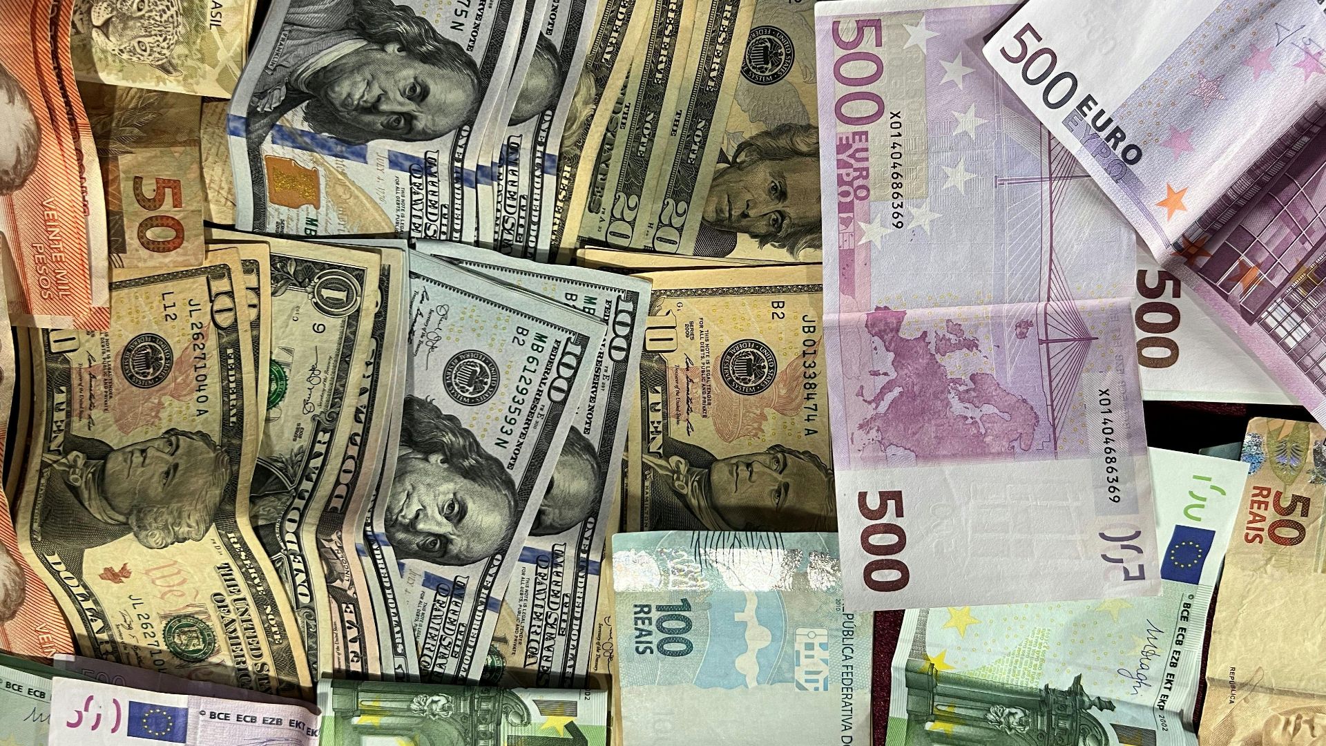 Assorted international banknotes showcasing different currencies. Ideal for finance-related themes.