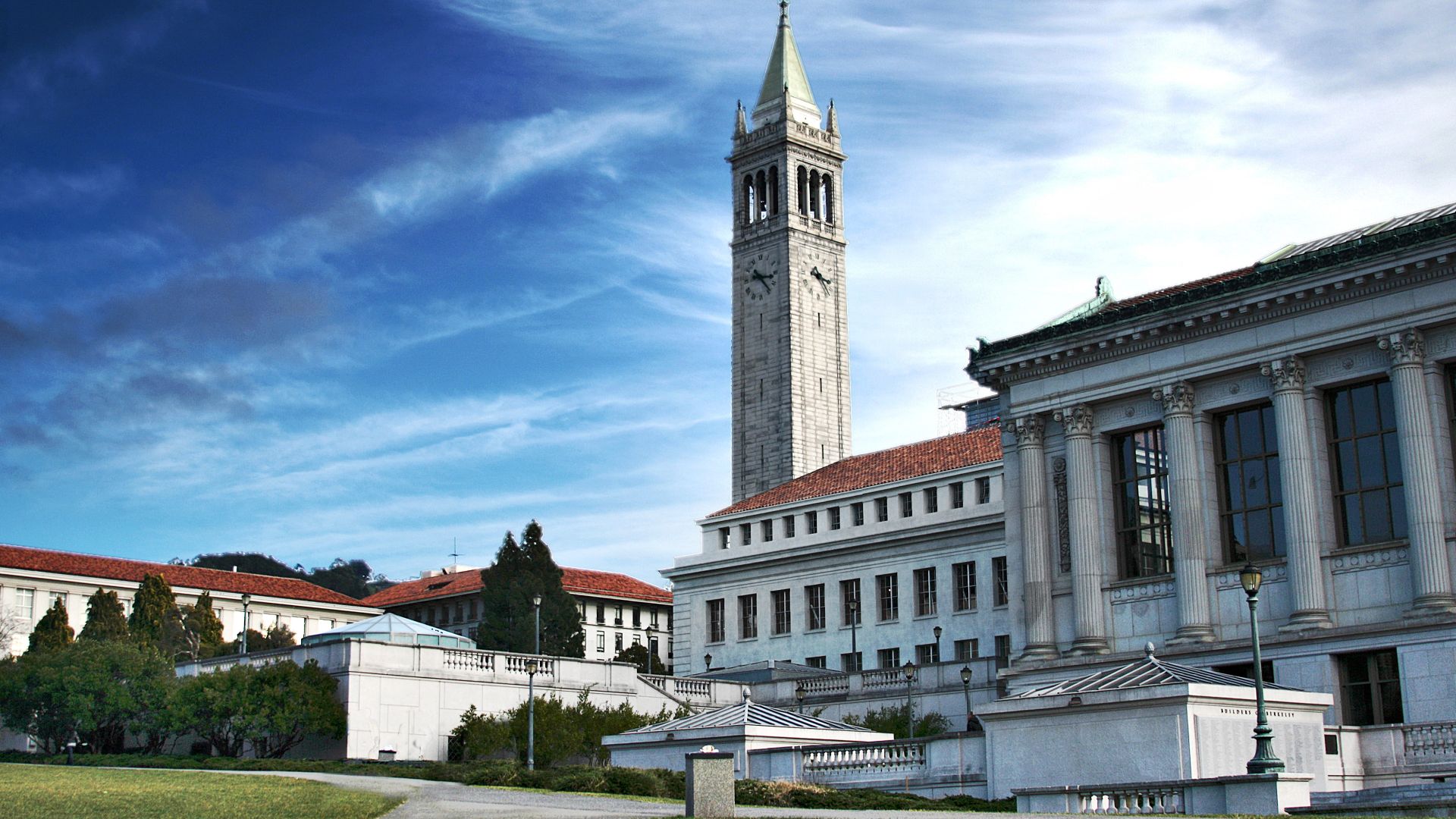 Campus of the UC Berkeley in Berkeley, California, United States. Photo taken on Memorial Glade, showing the Doe Memorial Library as well as Sather Tower (The Campanile) in the background.