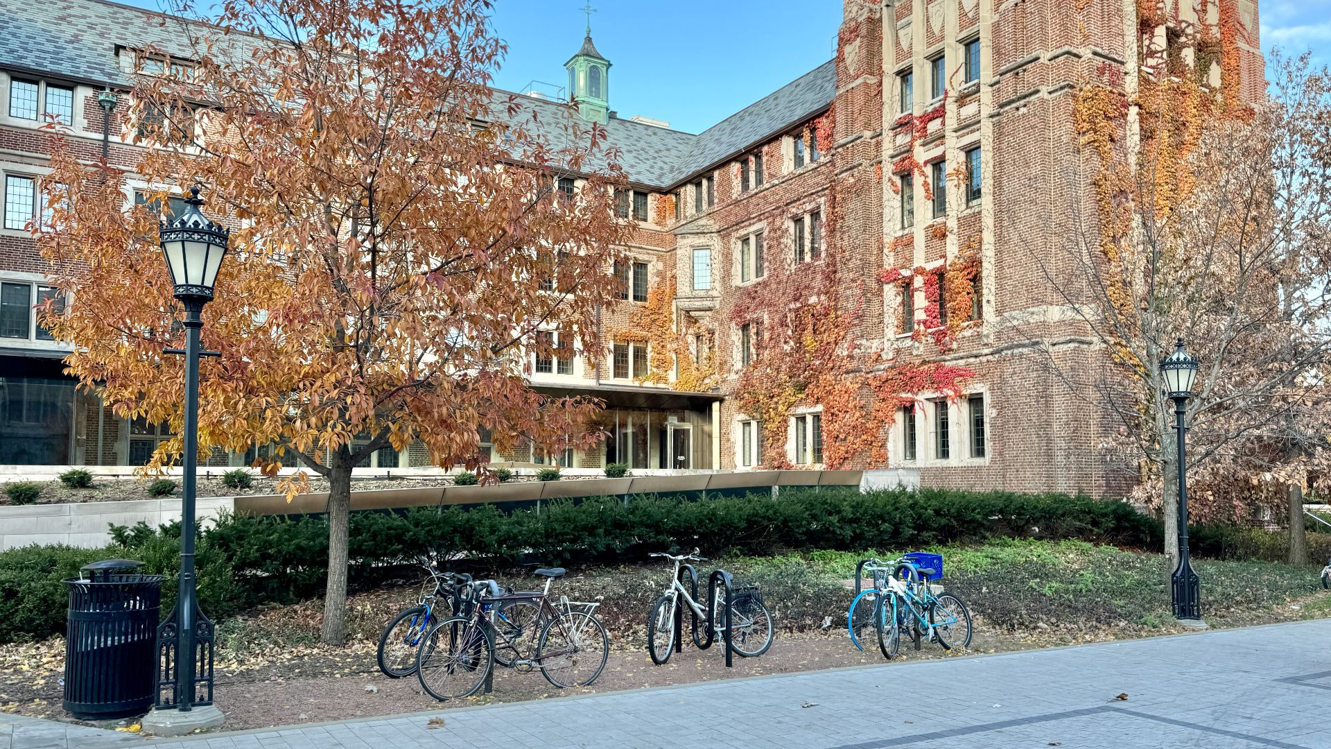Built in 1927-1928, this Gothic Revival-style building was designed by Riddle and Riddle to house the Chicago Theological Seminary, founded in 1855.  The building is clad in red brick with limestone trim, making it distinct among the Gothic Revival-style buildings of the University of Chicago campus, which are predominantly clad in limestone.  The building features gothic bays with tracery, leaded glass windows, a gabled and hipped slate roof, a tall tower at the main entrance with octagonal corner towers, an octagonal belfry, oriel windows, copper cupolas, and a contemporary rear addition.  Today, the building serves as the home of the Becker Friedman Institute for Research in Economics, with the Chicago Theological Seminary having moved to a new building elsewhere on campus in 2011.