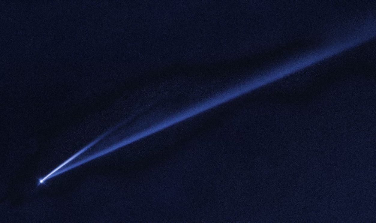 a light emitting from the top of a dark object