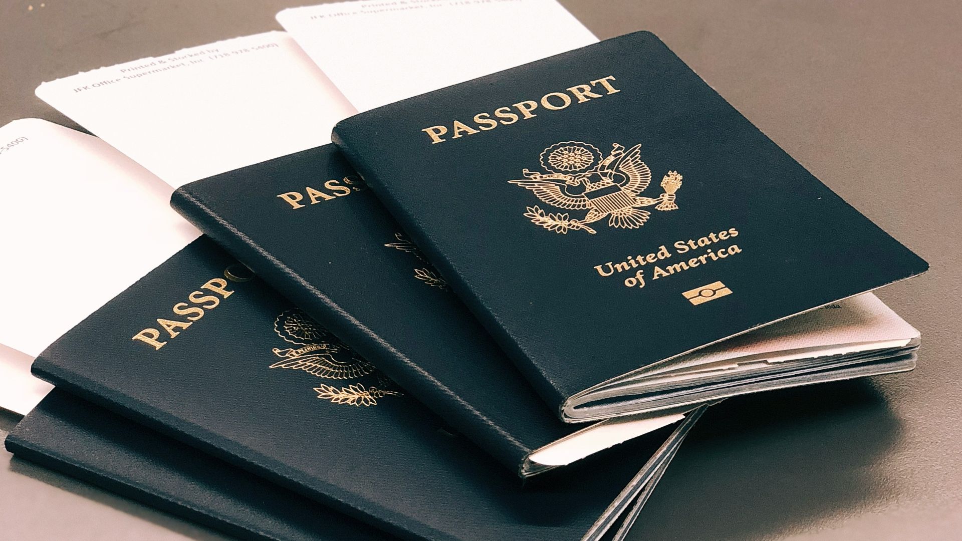 four green Passports