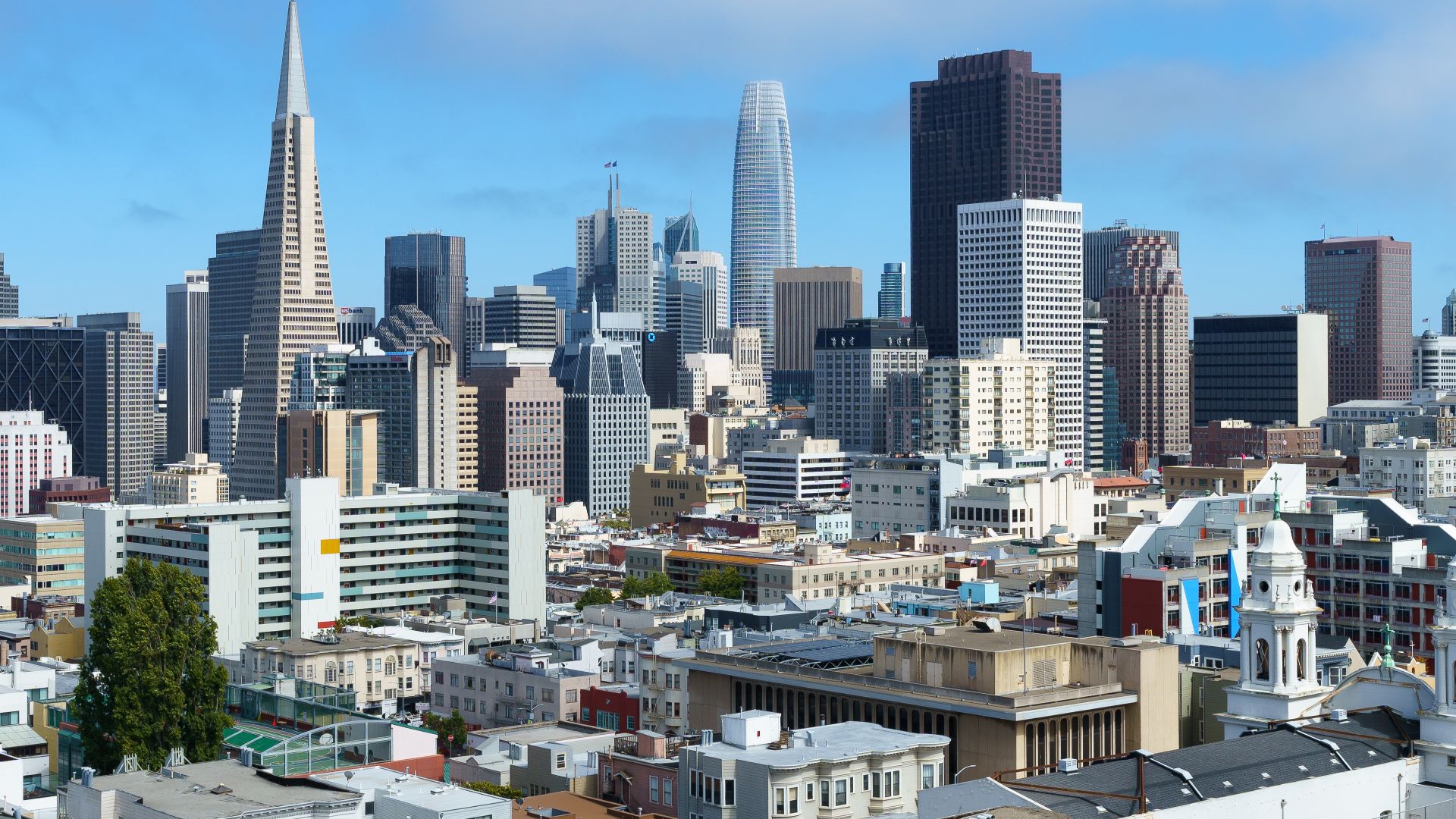 Skyline of downtown San Francisco from Ina Coolbrith Park on July 15, 2021. The small park is perched on the steep incline between Taylor and Mason streets and is named after Ina Coolbrith (1841–1928), an American poet and a prominent figure in the early San Francisco literary scene.
