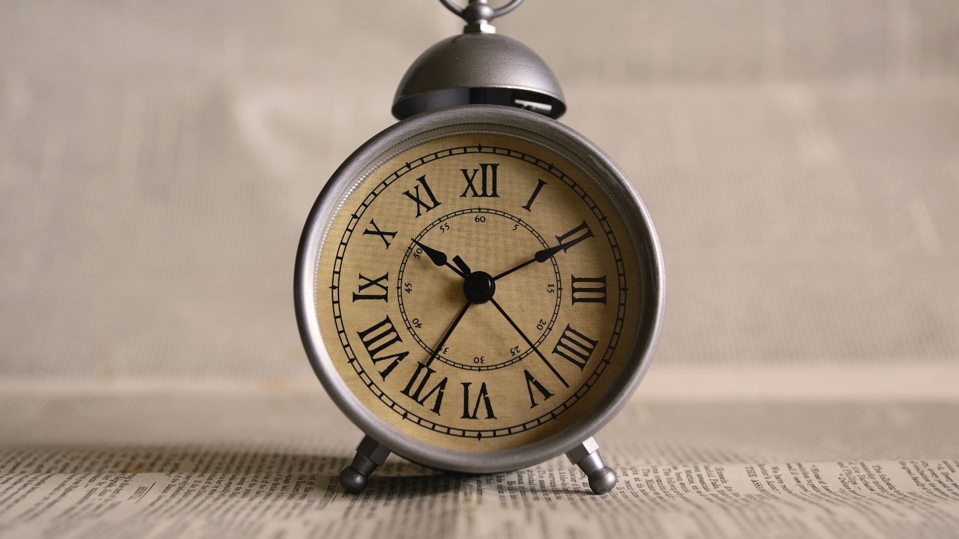 turned on gray alarm clock displaying 10:11