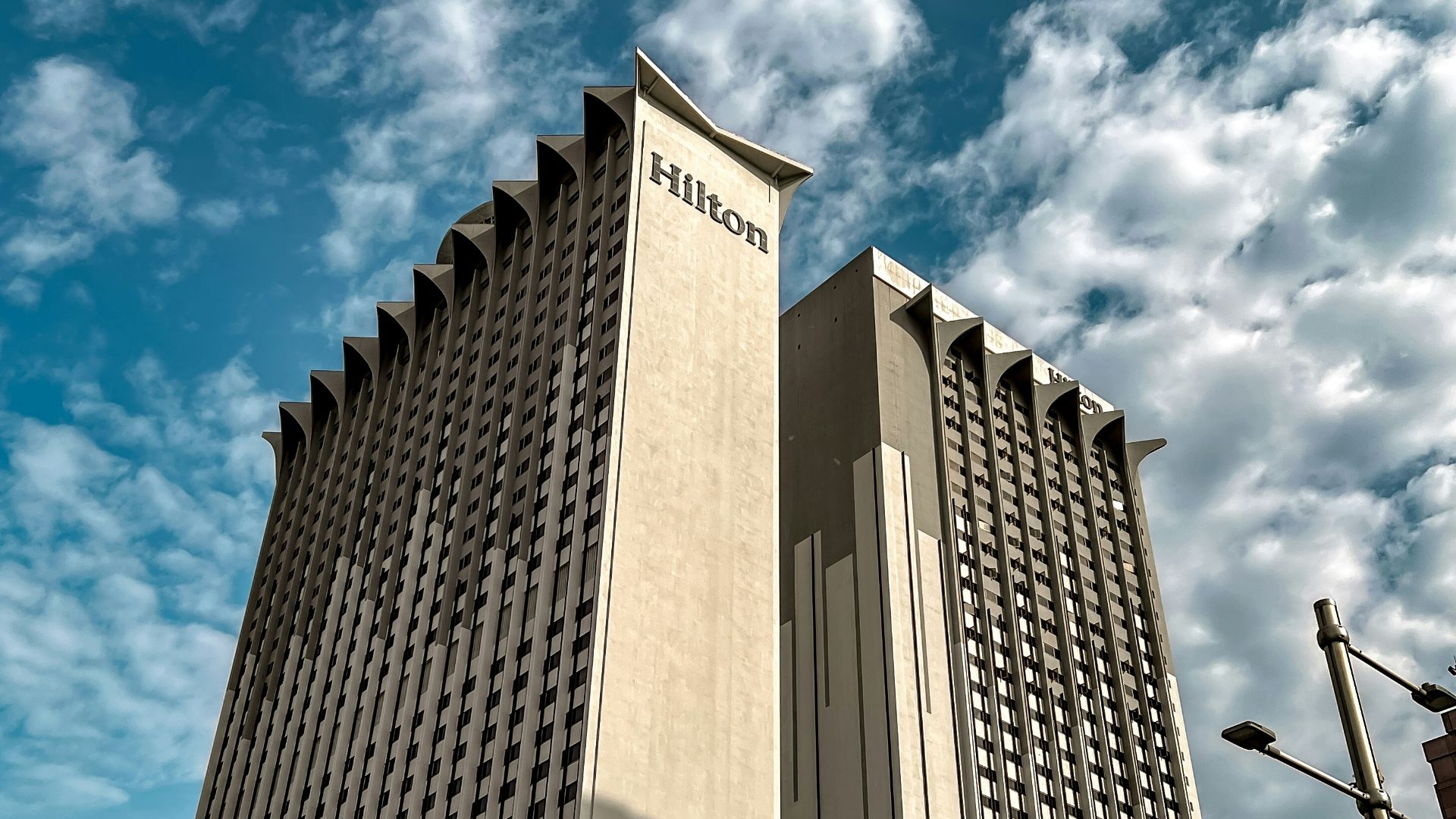 a tall building with a sign on it