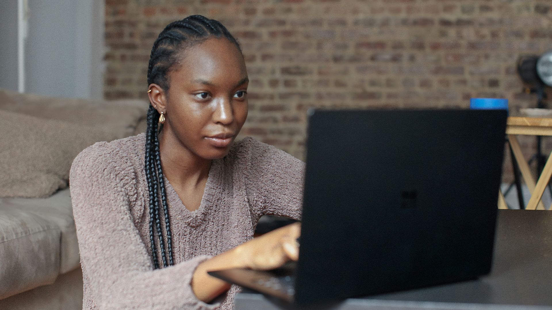 person using black Surface device