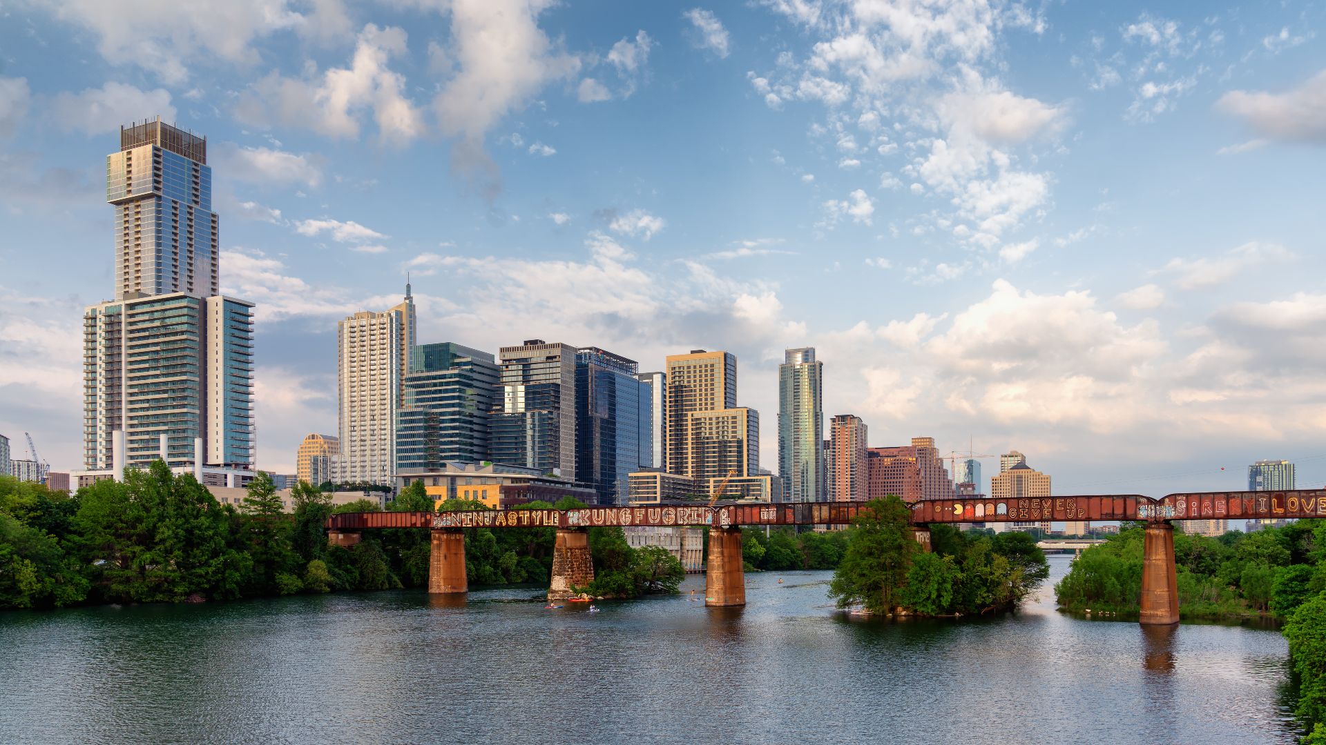 The skyline of Austin, Texas, as seen from a pedestrian bridge over the Colorado River.

© 2019 Tony Webster.