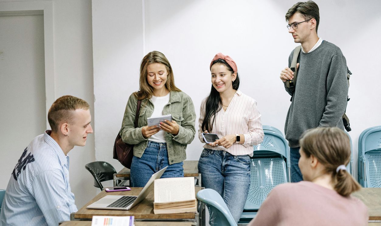 A diverse group of college students engaging in a lively study session