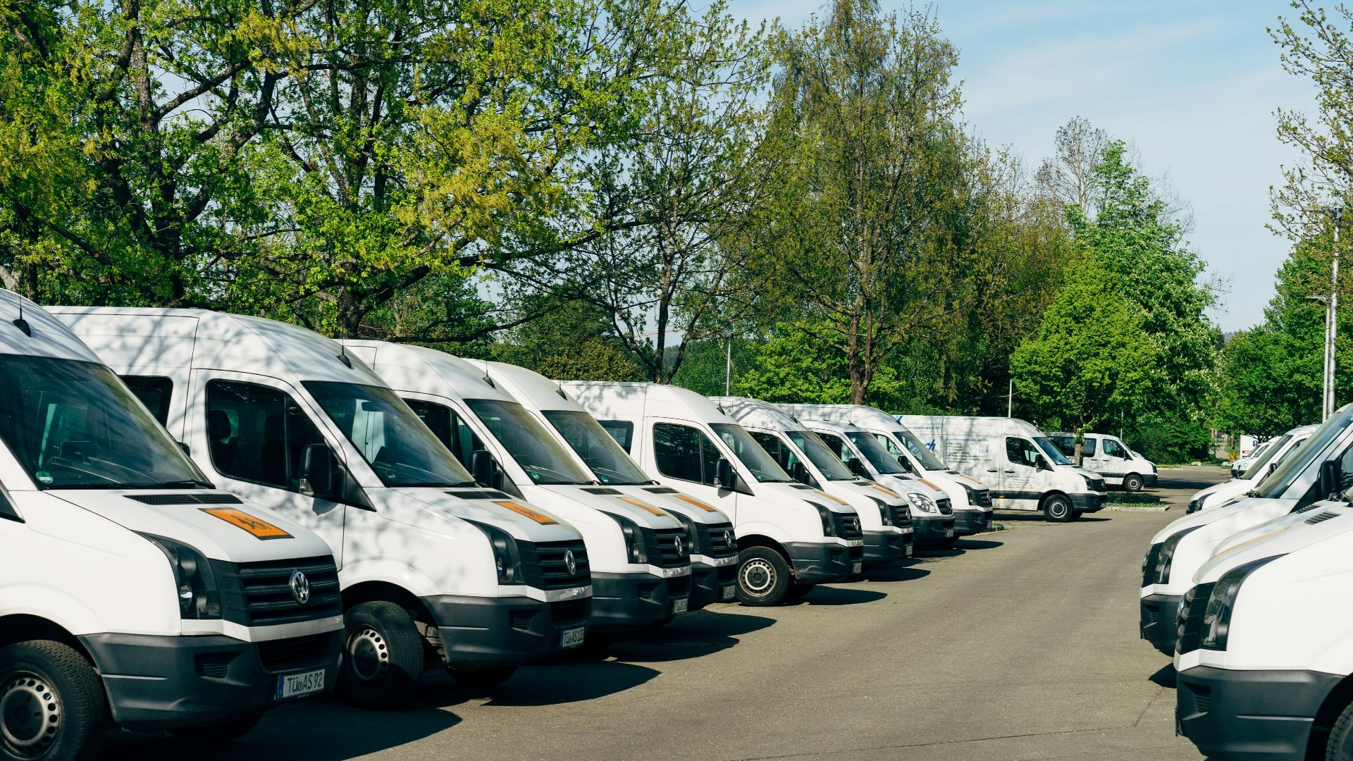 cars parked on parking lot during daytime