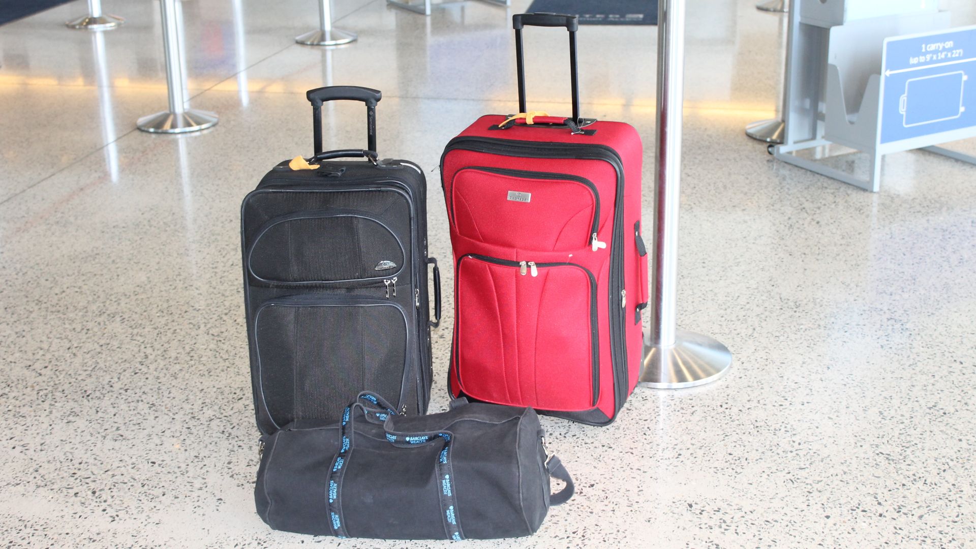 I took photo of luggage awaiting loading at airport.