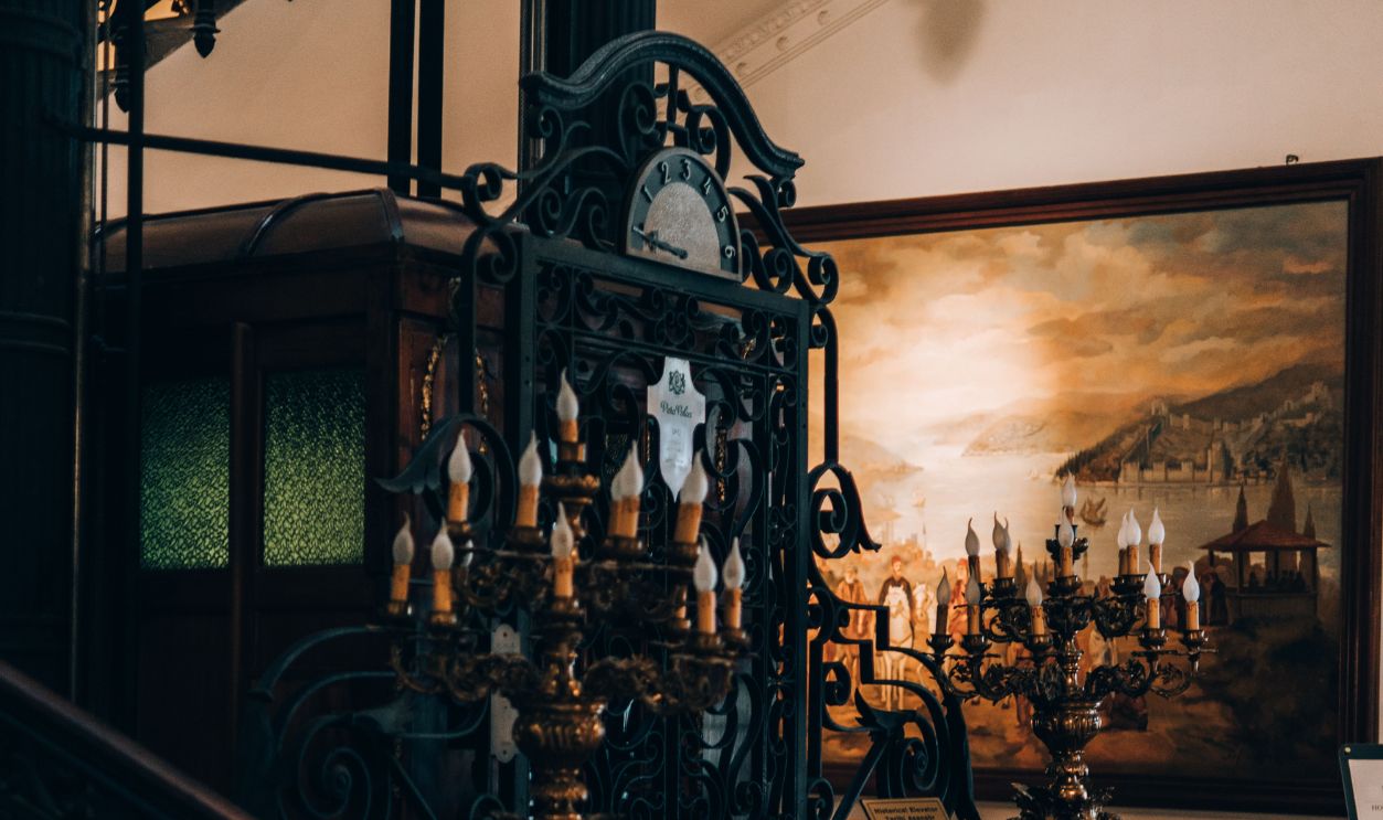 Explore this beautifully preserved vintage elevator with ornate details in Istanbul.