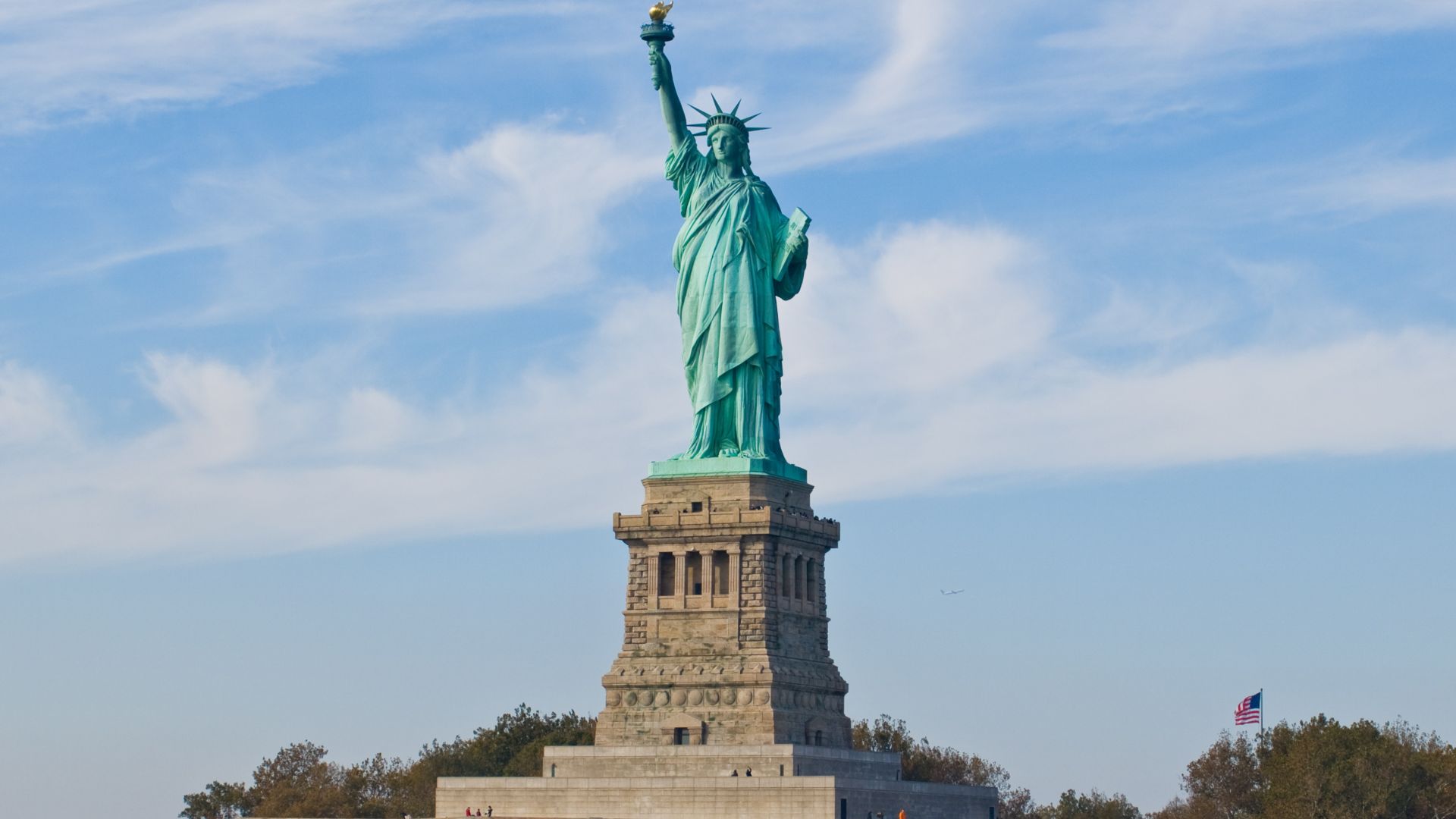 Statue of Liberty (more formally, Liberty Enlightening the World, and more colloquially, Lady Liberty) is a structure located on Liberty Island in New York Harbor, presented to the United States on the centennial of the signing of the American Declaration