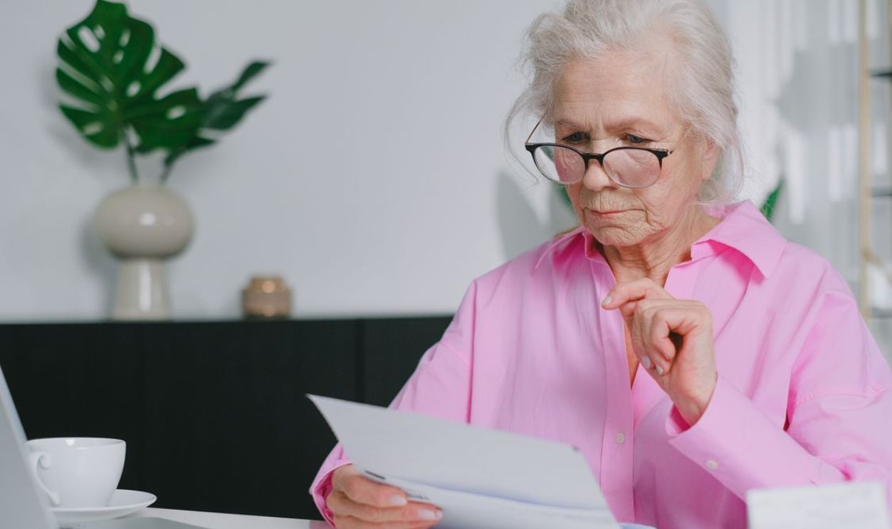 old women checking her document