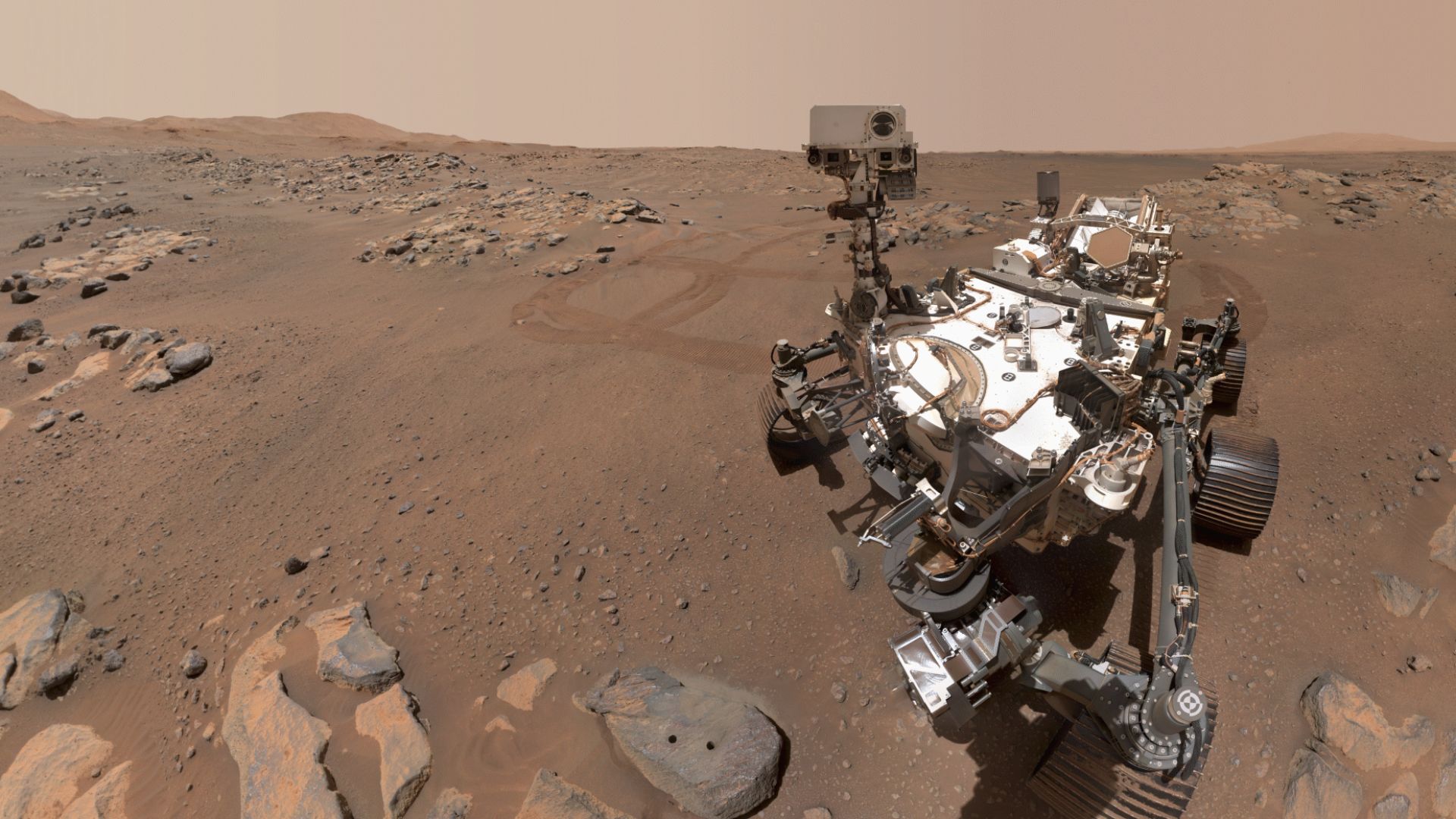 NASA’s Perseverance Mars rover took these 2 selfie versions over a rock nicknamed “Rochette,” on September 10, 2021, the 198th Martian day, or sol of the mission. Two holes are visible where the rover used its robotic arm to drill rock core samples. There