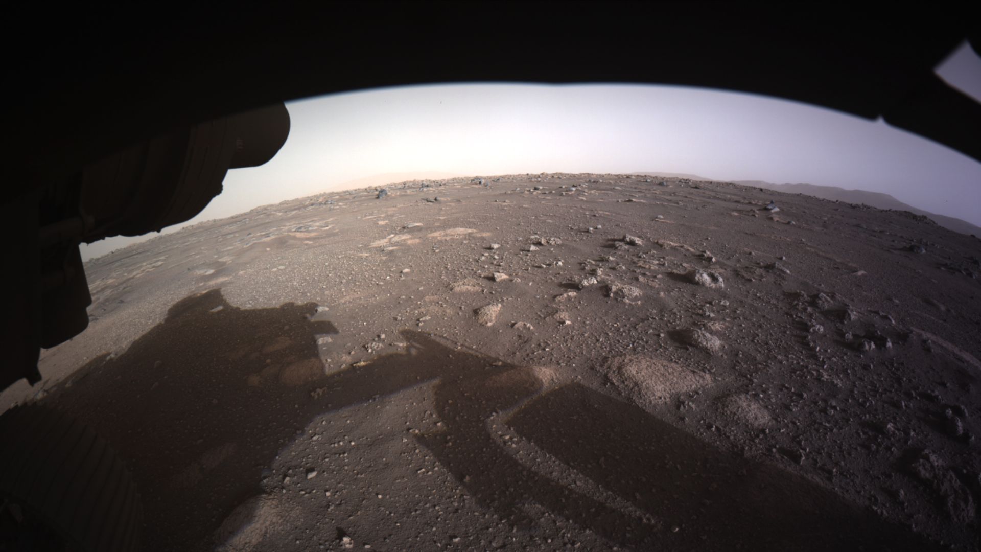 This is the first high-resolution, color image to be sent back by the Hazard Cameras (Hazcams) on the underside of NASA’s Perseverance Mars rover after its landing on Feb. 18, 2021.
A key objective for Perseverance’s mission on Mars is astrobiology, inclu