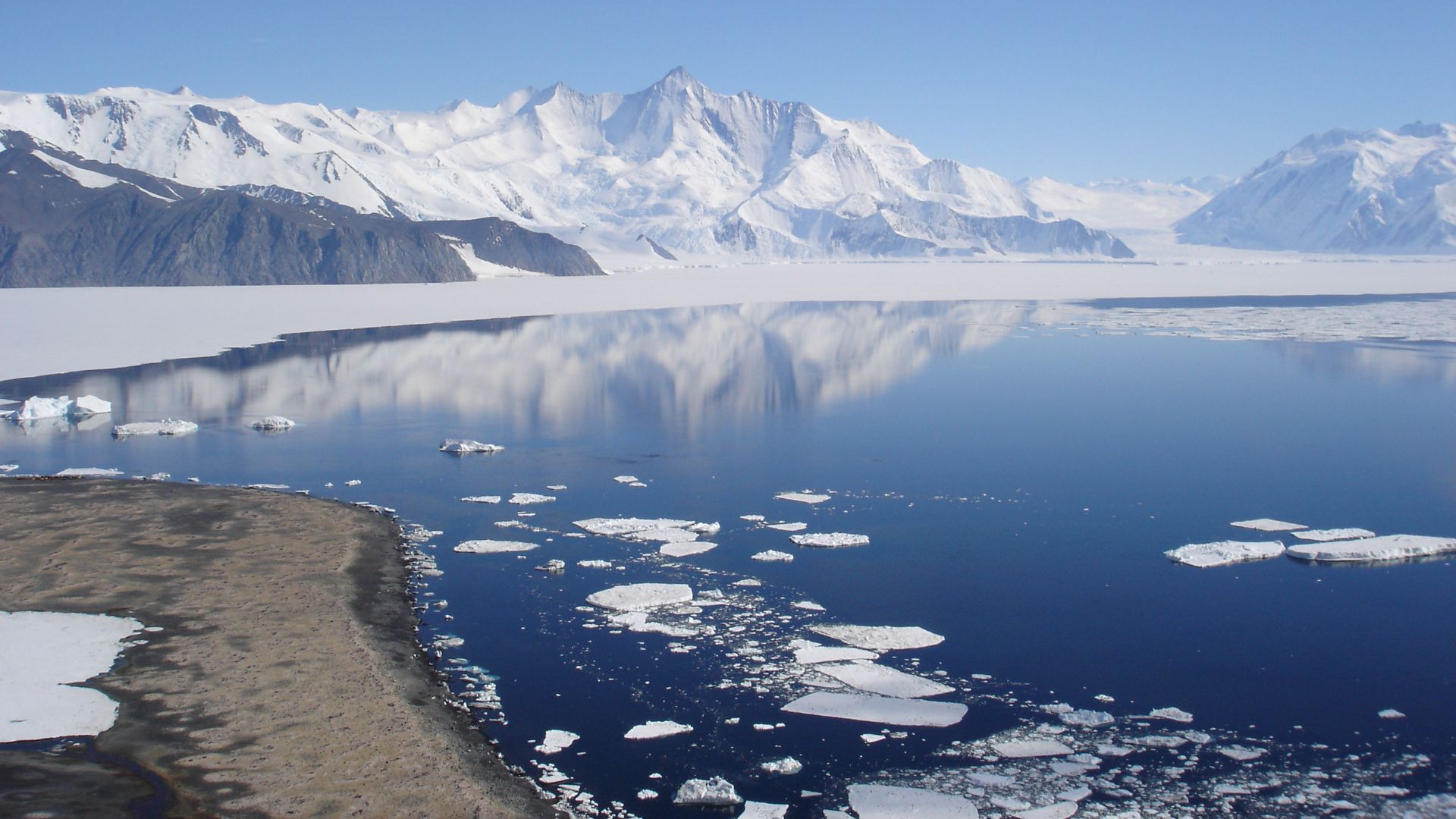 Mt Herschel (3335m asl) from Cape Hallet with Seabee Hook penguin colony in Foreground. Antarctica.