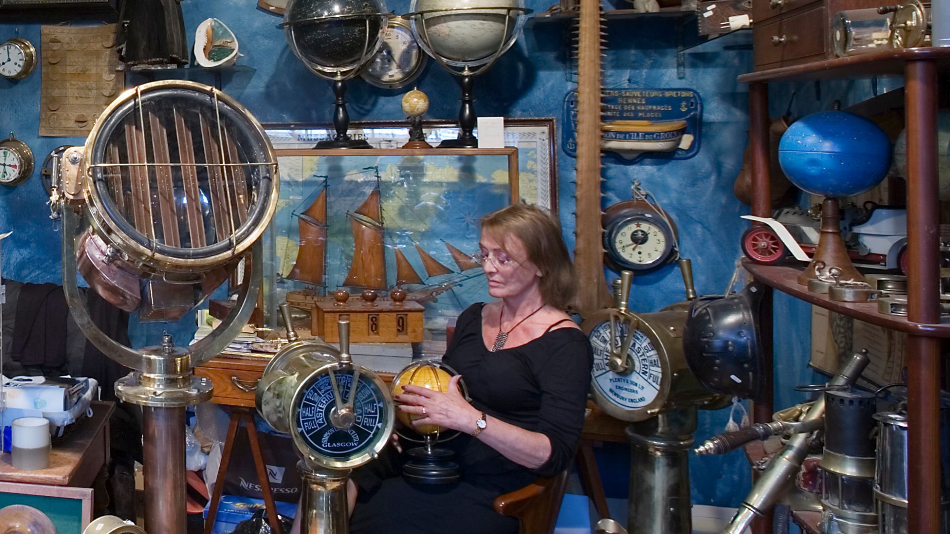 Vintage travel gear seller at the marché Dauphine, Saint Ouen
