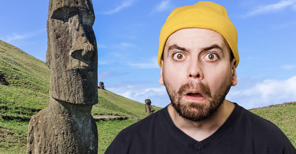 moai statues and shocked man wearing a beanie