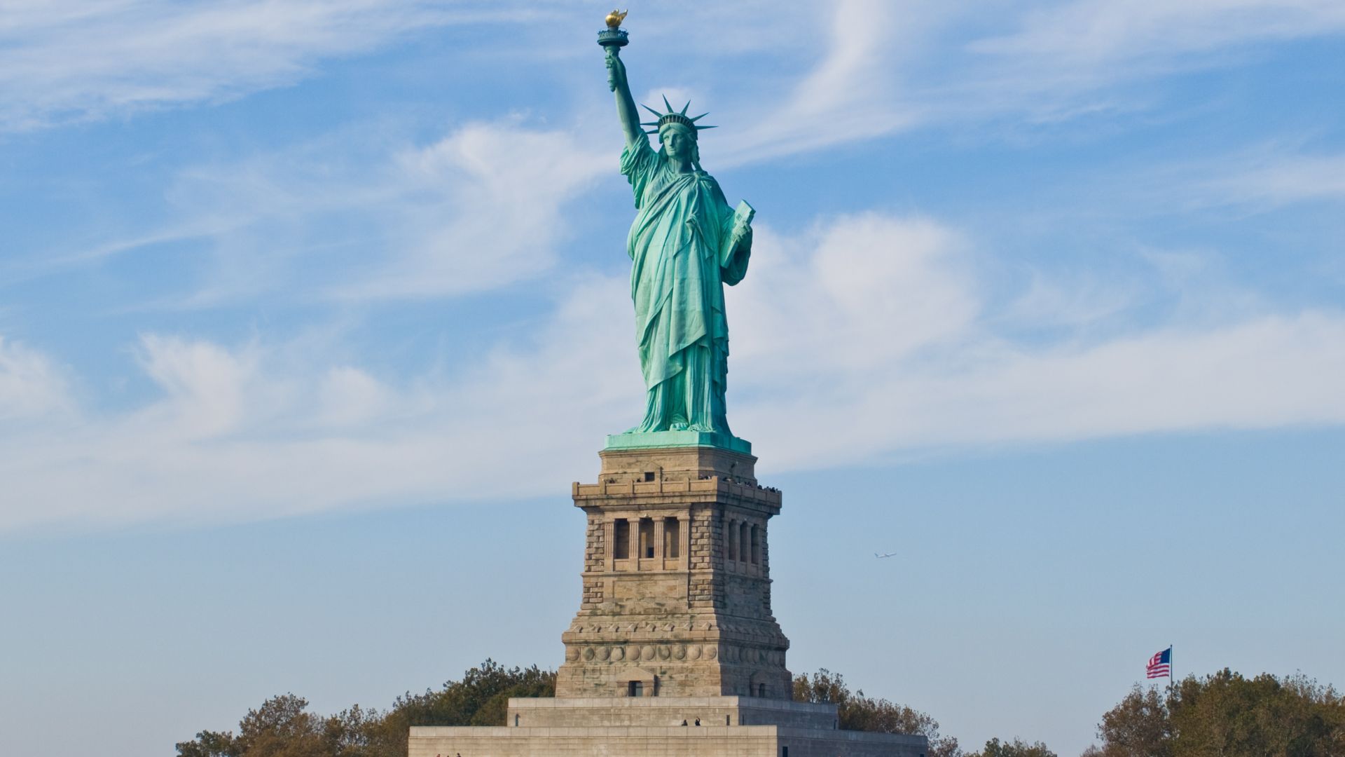 Statue of Liberty (more formally, Liberty Enlightening the World, and more colloquially, Lady Liberty) is a structure located on Liberty Island in New York Harbor, presented to the United States on the centennial of the signing of the American Declaration