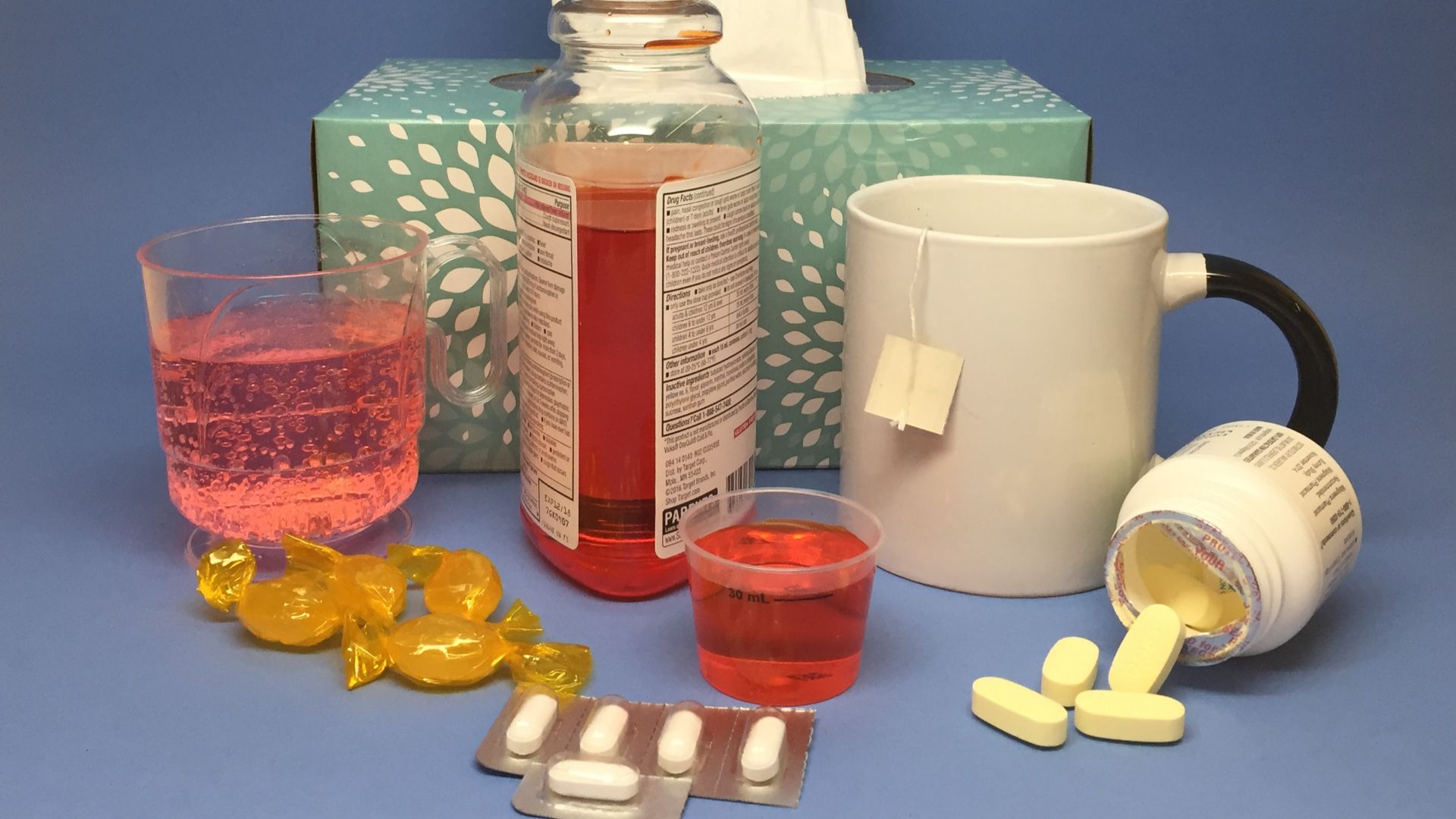 Various treatments for the common cold - liquid and pill cold medicine, tea, throat lozenges, tissues, and over-the-counter decongestants. Credit: NIAID