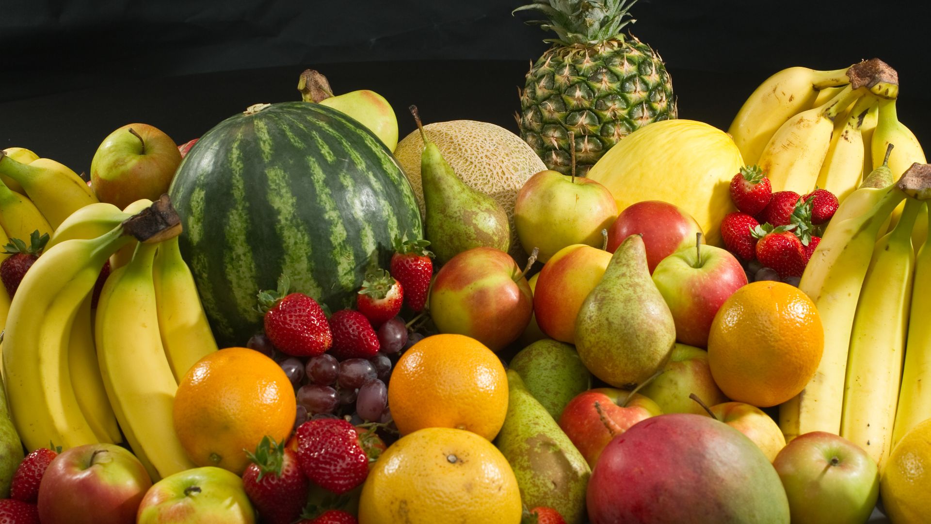 Common culinary fruits. Bananas, apples, pears, strawberries, oranges, grapes, canary melons, water melon, cantaloupe, pineapple and mango.
Picture by Bill Ebbesen,