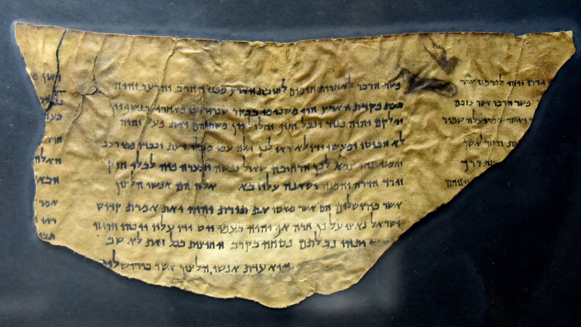 This is part of Dead Sea Scroll of Pesher Isaiah (4Q162), from Qumran Cave 4. From Qumran (Khirbet Qumran or Wadi Qumran), West Bank of the Jordan River, near the Dead Sea, modern-day State of Israel. The Jordan Museum, Amman, Jordan Hashimite Kingdom.