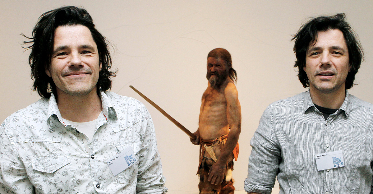 Dutch artists Adrie Kennis (L) and Alfons Kennis, who made the reconstruction of a mummy of an iceman named Otzi, discovered on 1991 in the Italian Schnal Valley glacier, pose near the statue displayed at the Archaeological Museum of Bolzano on February 28, 2011 during an official presentation.