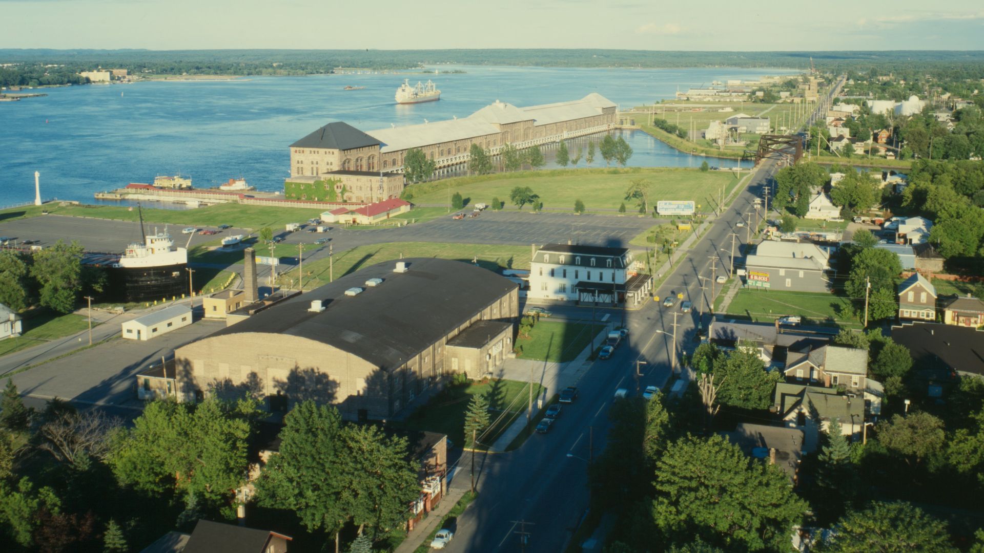 Powerhouse from Tower of History, general view southeast. Michigan Lake Superior Power Company, Portage Street, Sault Ste. Marie, Chippewa County, MI Date: July, 1978 Photographer: Jet Lowe