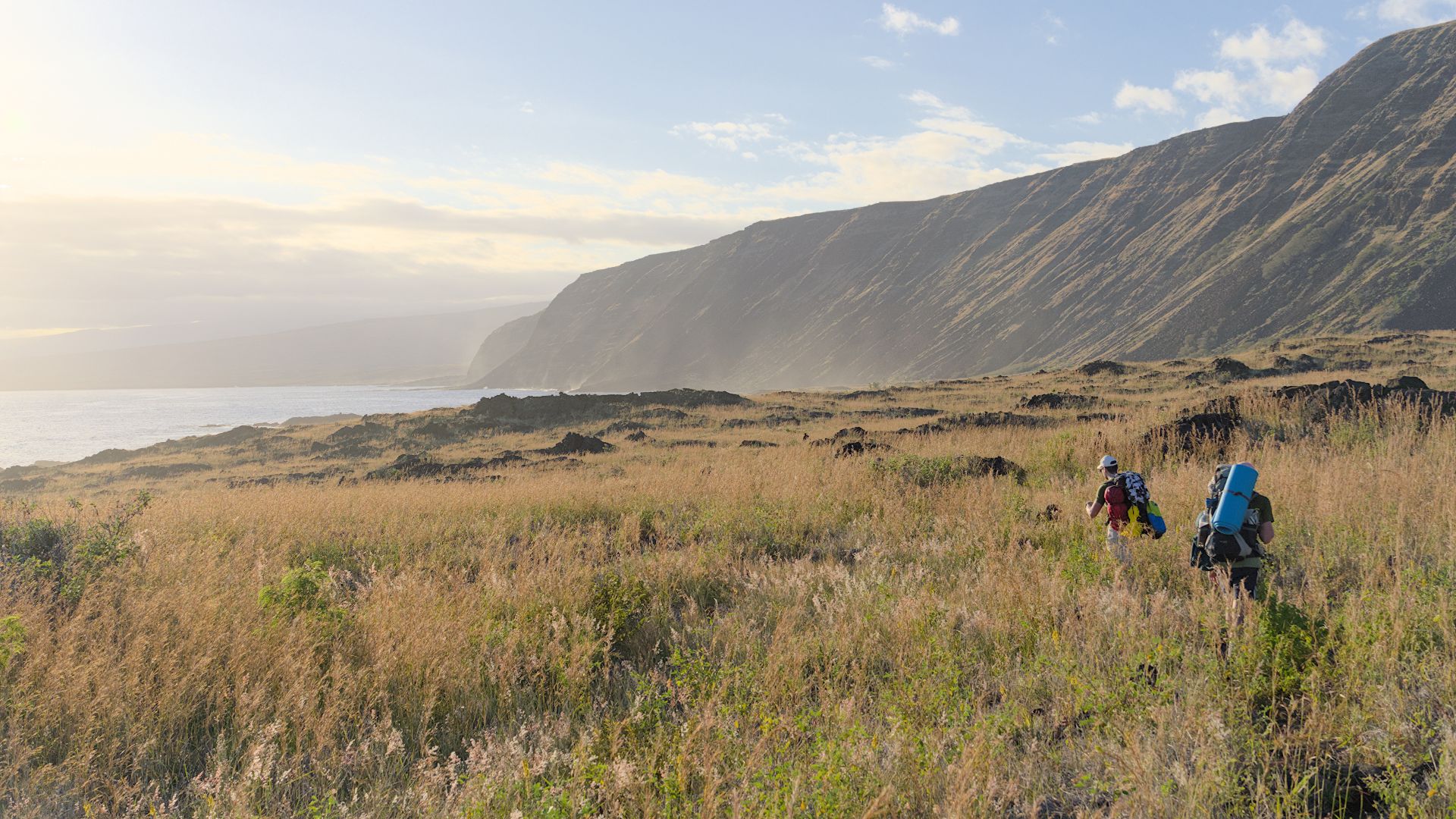 Trekkers heading West towards Halapē in Hawaiʻi Volcanoes National Park