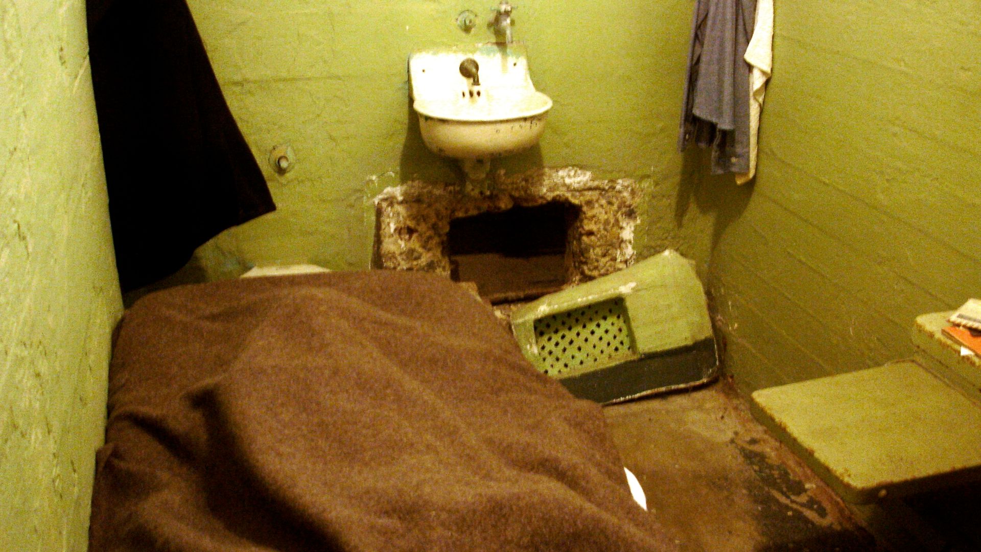 Chiseled air vent in one of the cells on Alcatraz that led to the utility corridor.