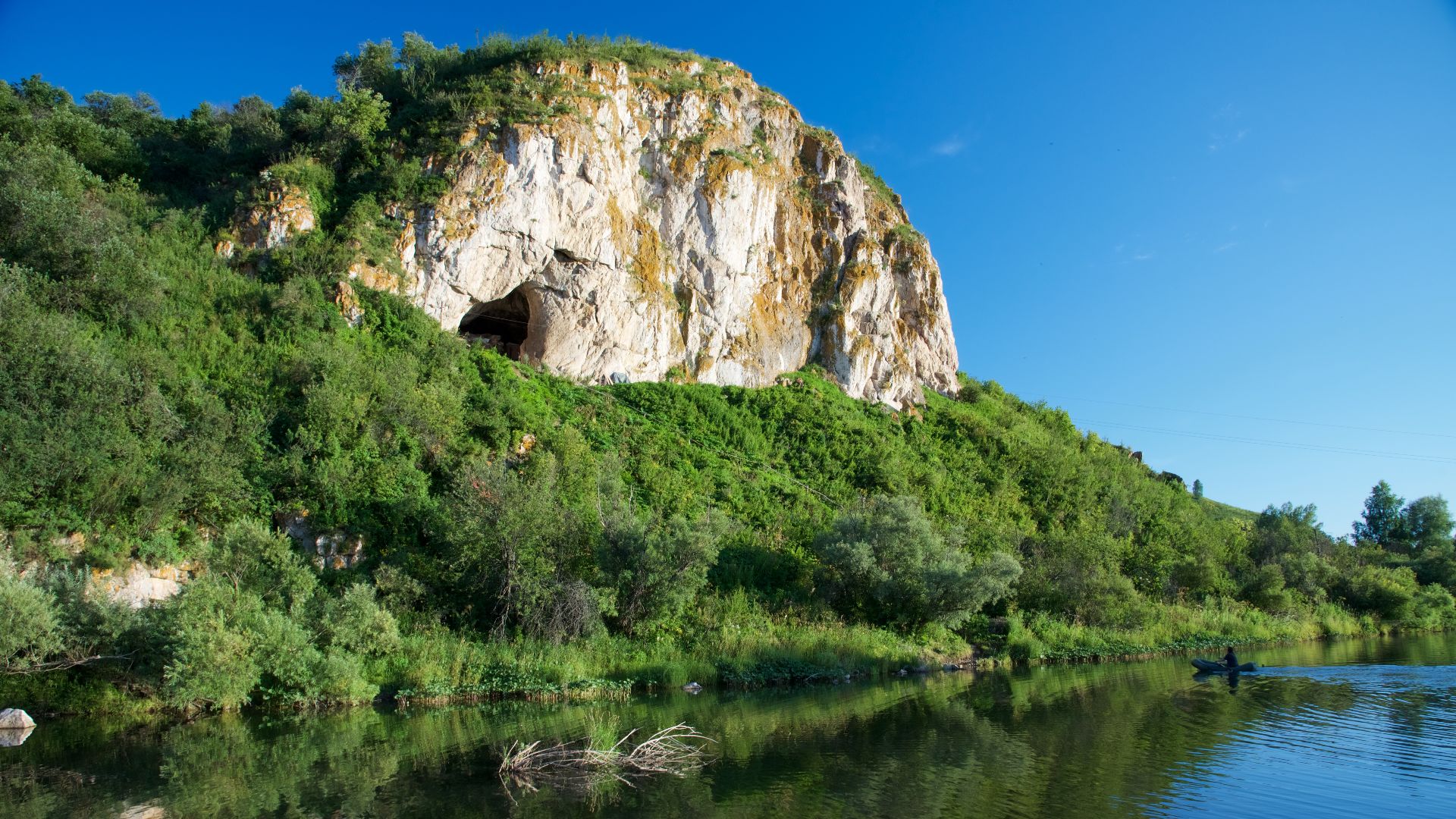 View of the Neanderthal site Chagyrskaya cave, Alta Mountains, Russia.