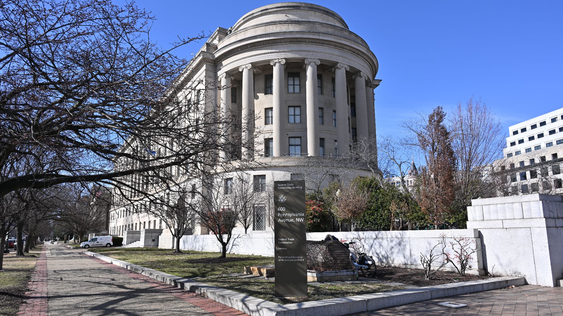 The Federal Trade Commission building is located on a triangle of land bounded by Pennsylvania Ave, Constitution Ave, and 7th St NW.  The building fits into this parcel by having a roughly triangular shape with the narrow end with a  curved corner.  This 