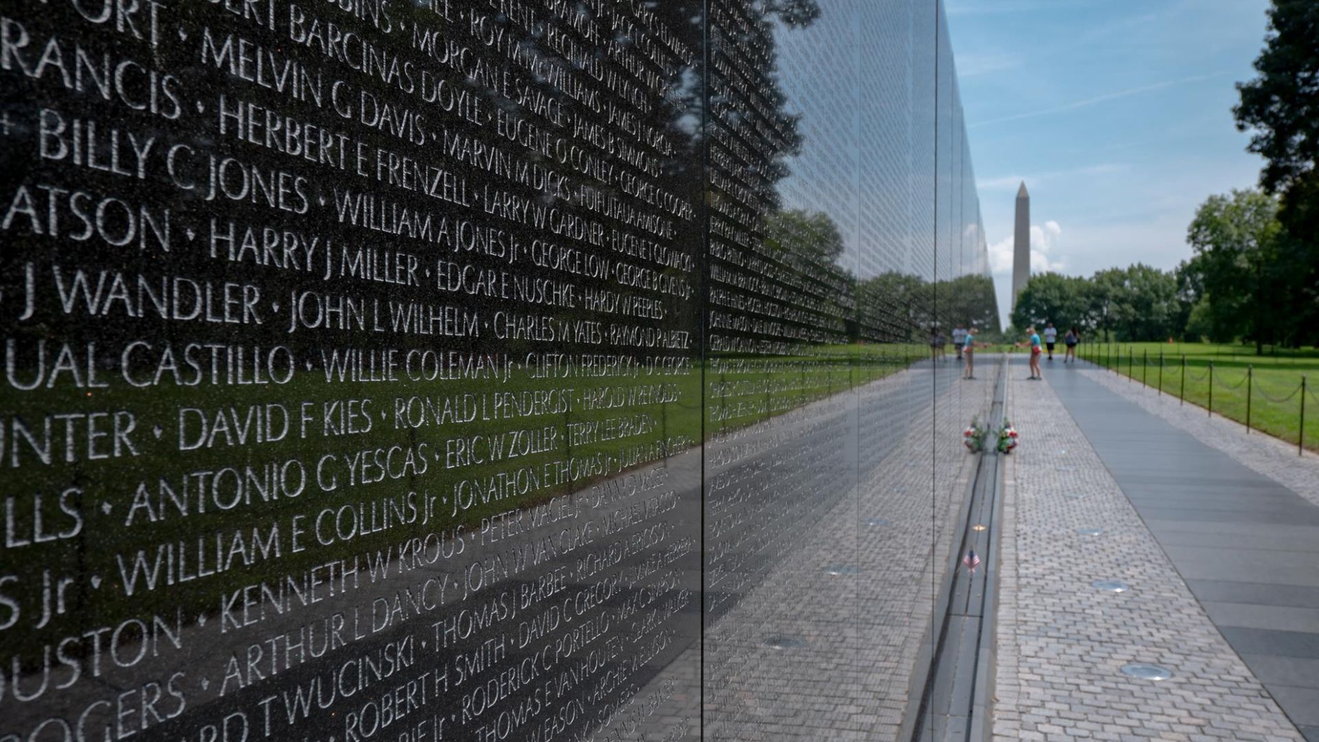 Vietnam Memorial Wall with Washington Monument