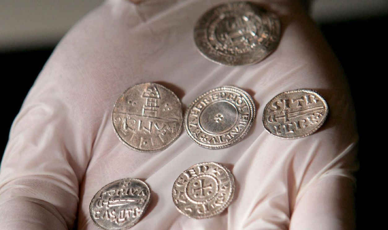 Getty Images - 805234748 - A selection of coins, part of the conserved objects from a major Viking treasure hoard, going on display at The British Museum, London and the Yorkshire Museum in York.