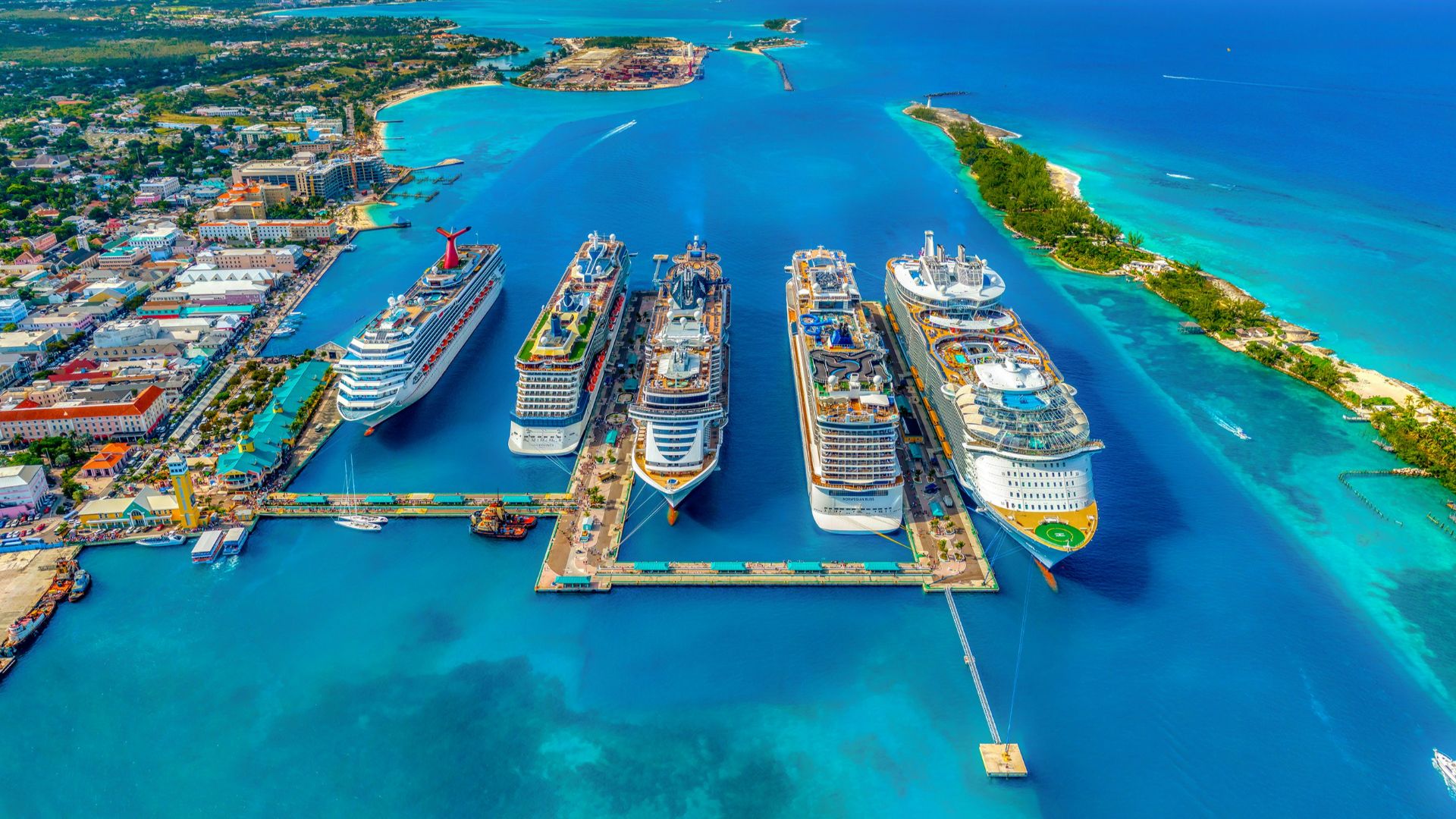 aerial photography of white and blue cruise ships during daytime
