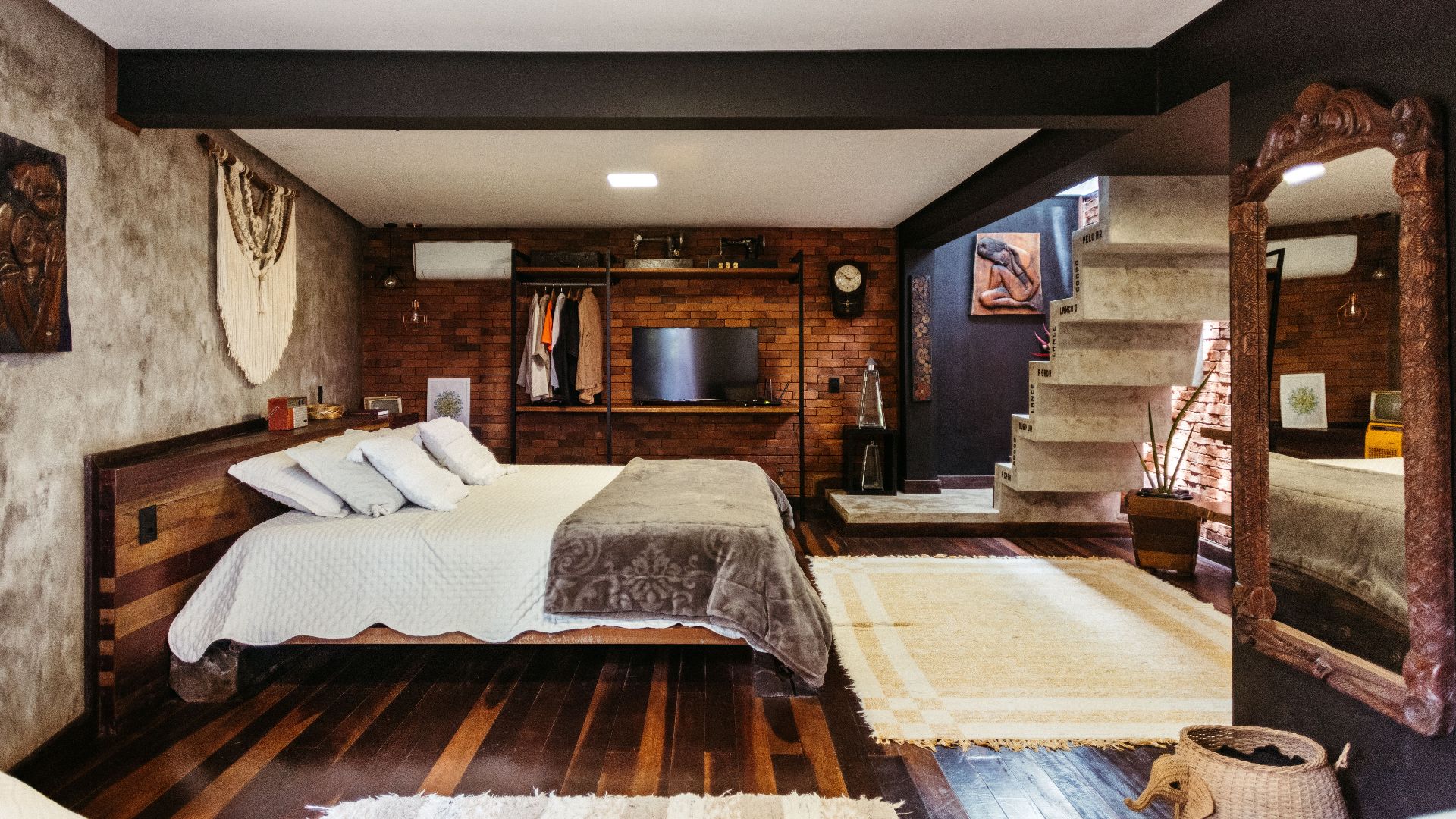 Cozy rustic modern bedroom with unique decor in Santa Teresa, Brazil.