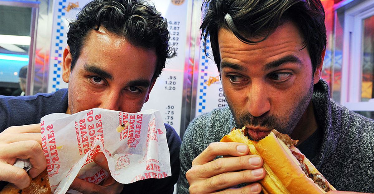 Taylor Gourmet's David Mazza, left, and Casey Patten taste test the cheesesteaks at Steve's Prince of Steaks on September 6, 2011 in Philadelphia, Pa.