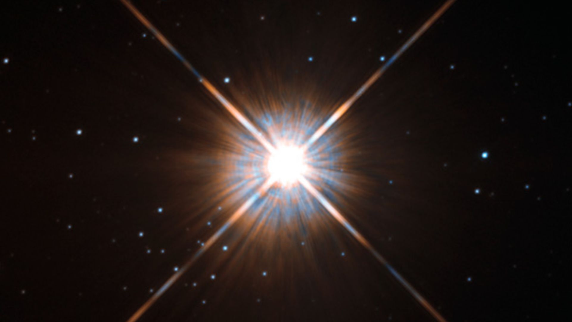 Shining brightly in this Hubble image is our closest stellar neighbour: Proxima Centauri.
Proxima Centauri lies in the constellation of Centaurus (The Centaur), just over four light-years from Earth. Although it looks bright through the eye of Hubble, as 