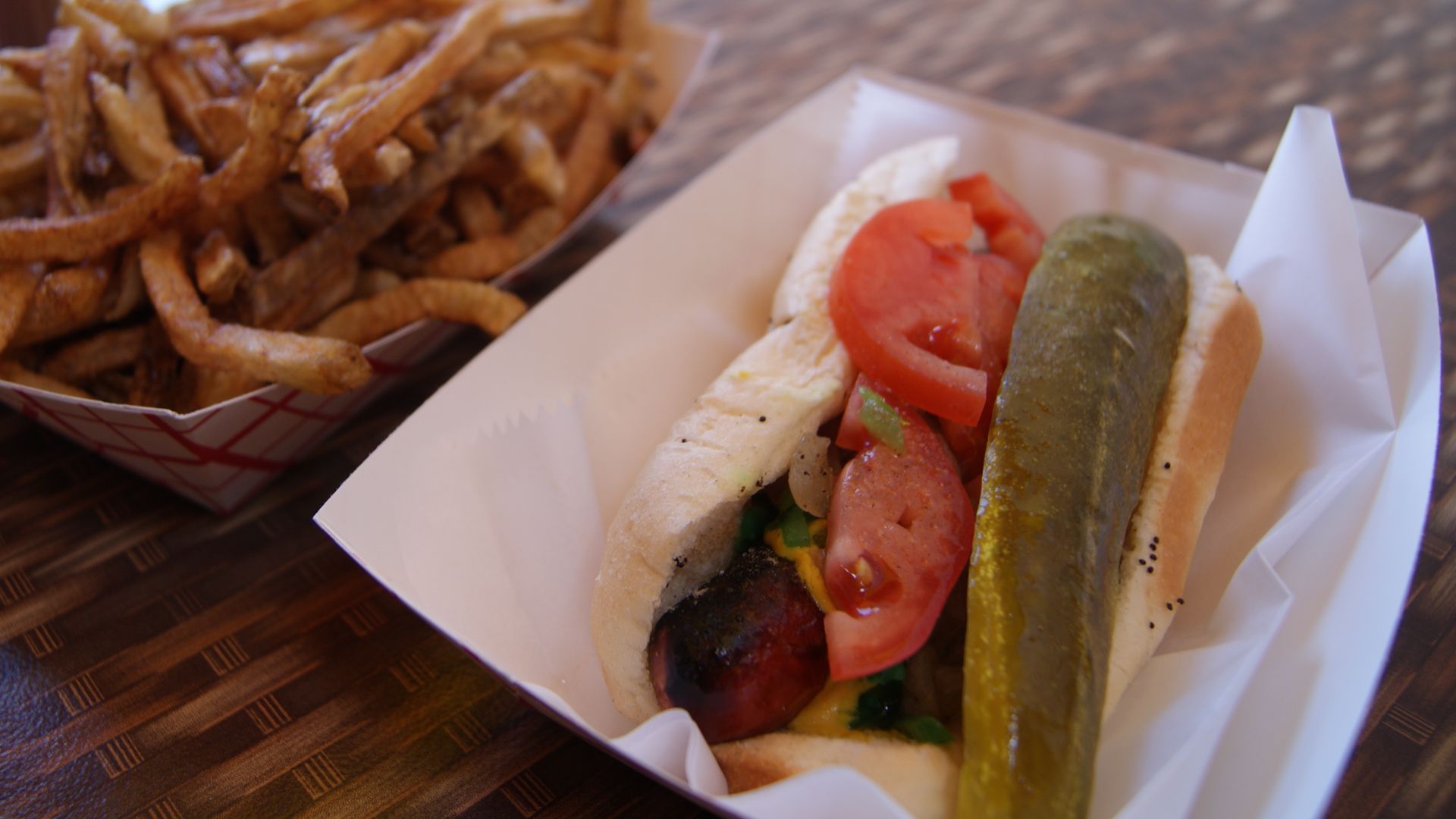 A Chicago-style hot dog and duck fat fries.