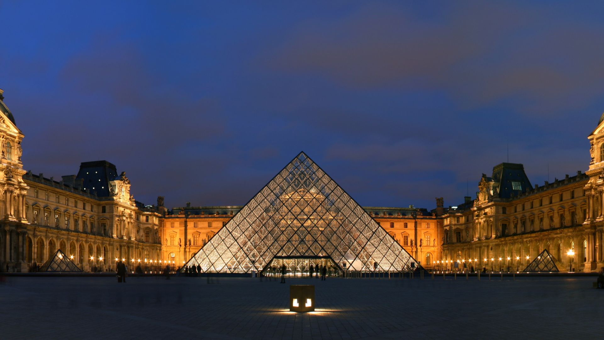 Courtyard of the Museum of Louvre, and its pyramid. This picture is a panorama made from stitching three pictures with Hugin.
