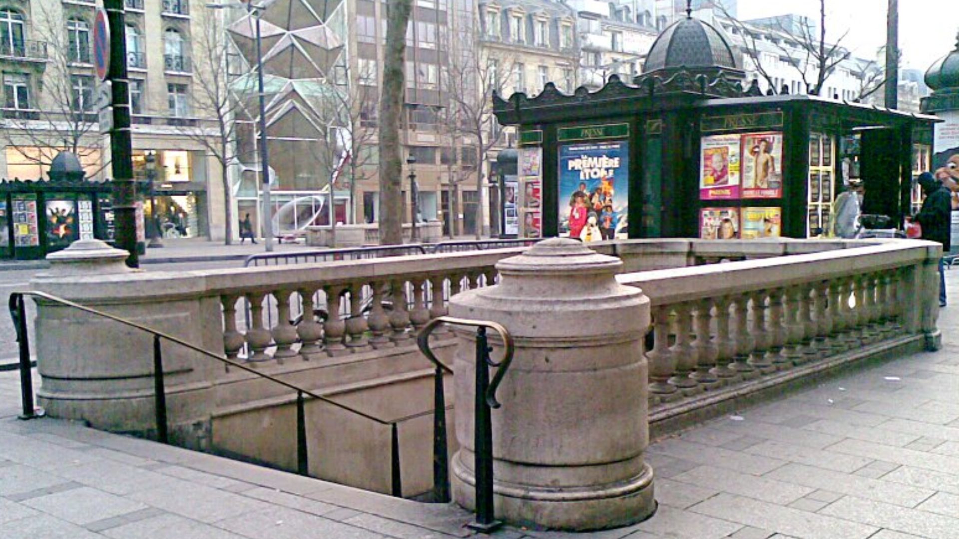 Exterior entrance of Paris Métro station in Greek-Roman classical style. Franklin Roosevelt, Champs-Élysées.
