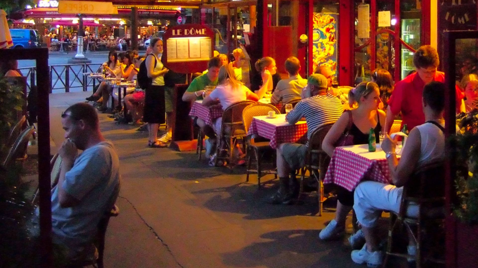 Paris Cafe near the Eiffel Tower (Café Le Dôme, 47 Avenue de la Bourdonnais, VIIe arrondissement) at dusk. Fuji F11 Camera at ISO 1600.
