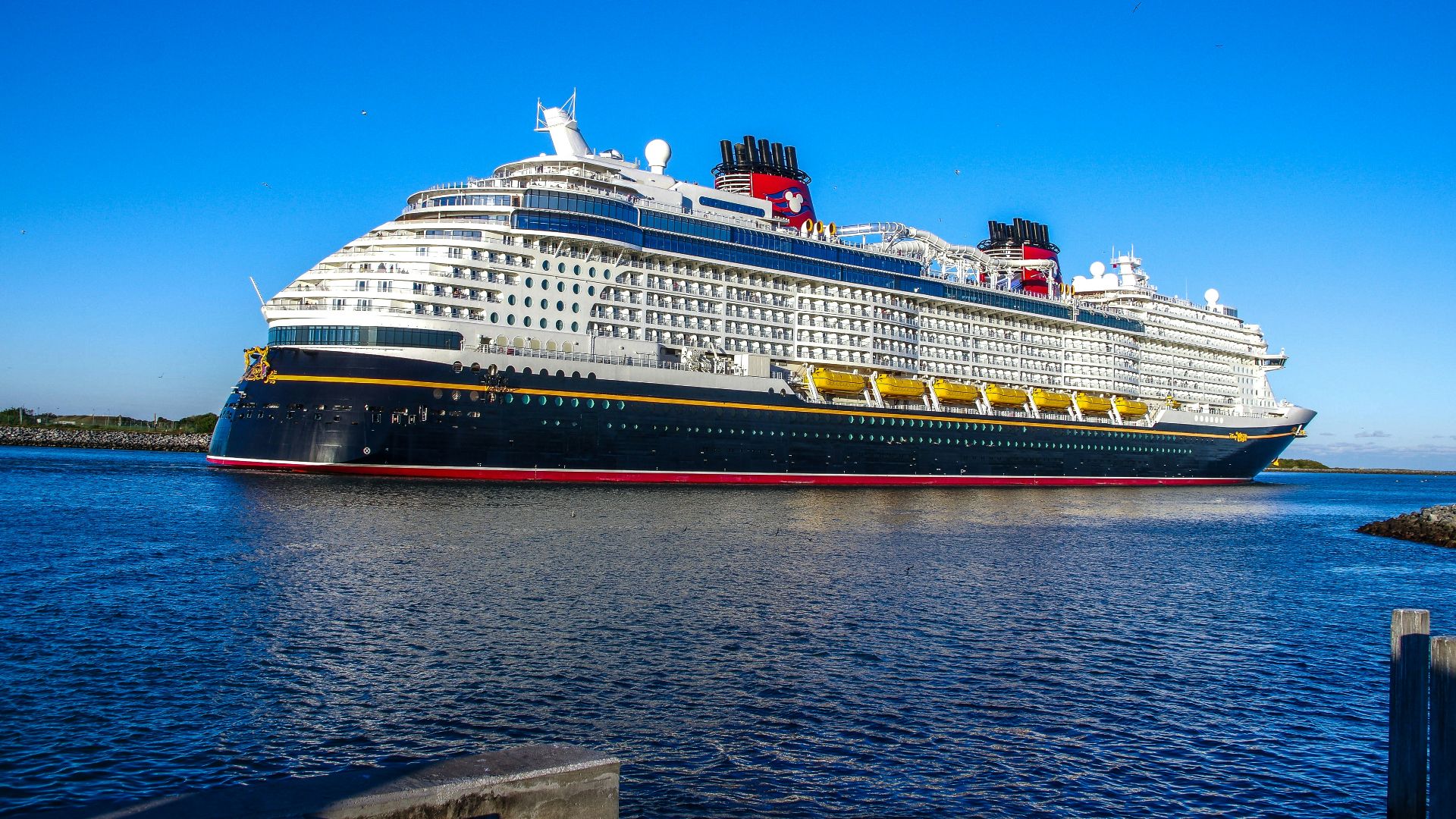 a large cruise ship in a body of water