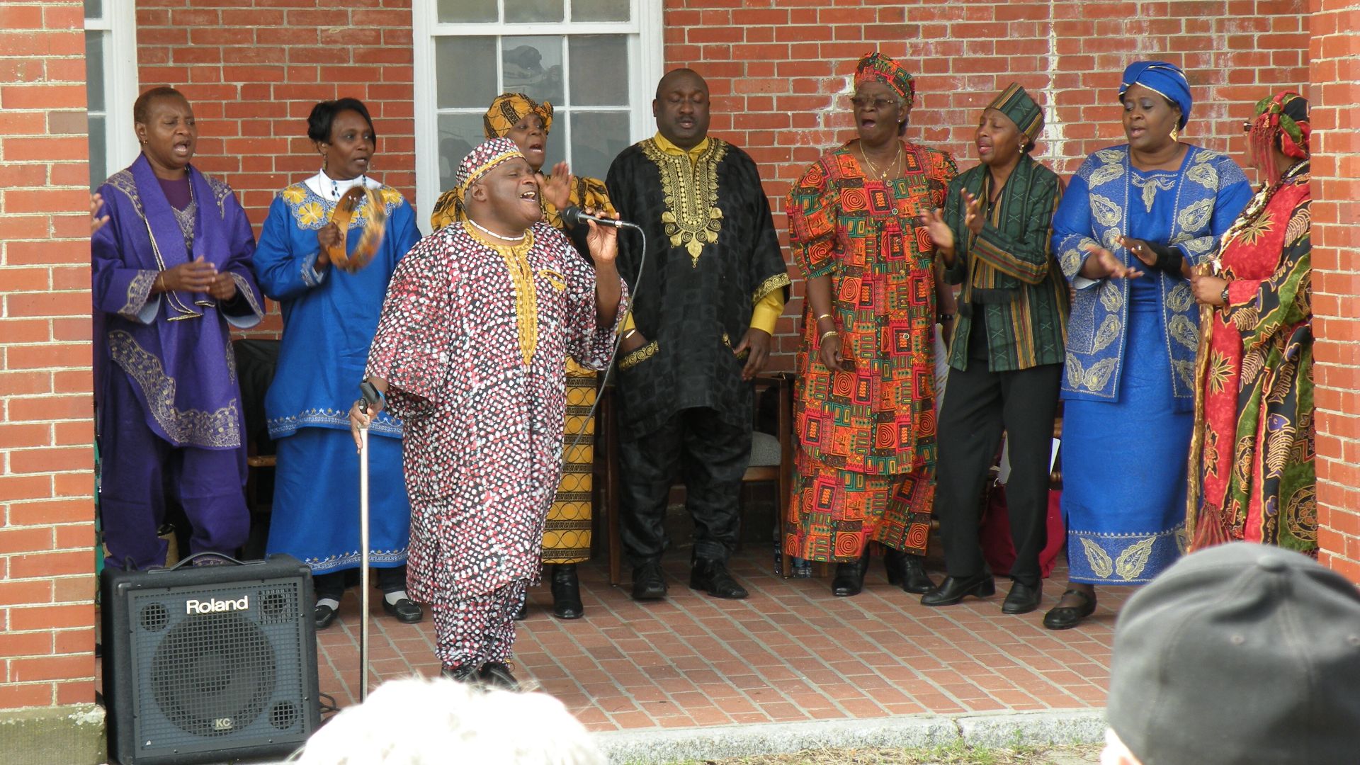 A group of men and women standing in front of a brick building, singing and clapping in tradition African clothing.
Gullah dancers showcase traditional dance and songs, 2011. As part of the Gullah Geechee Cultural Heritage Corridor, Fort Pulaski has stron
